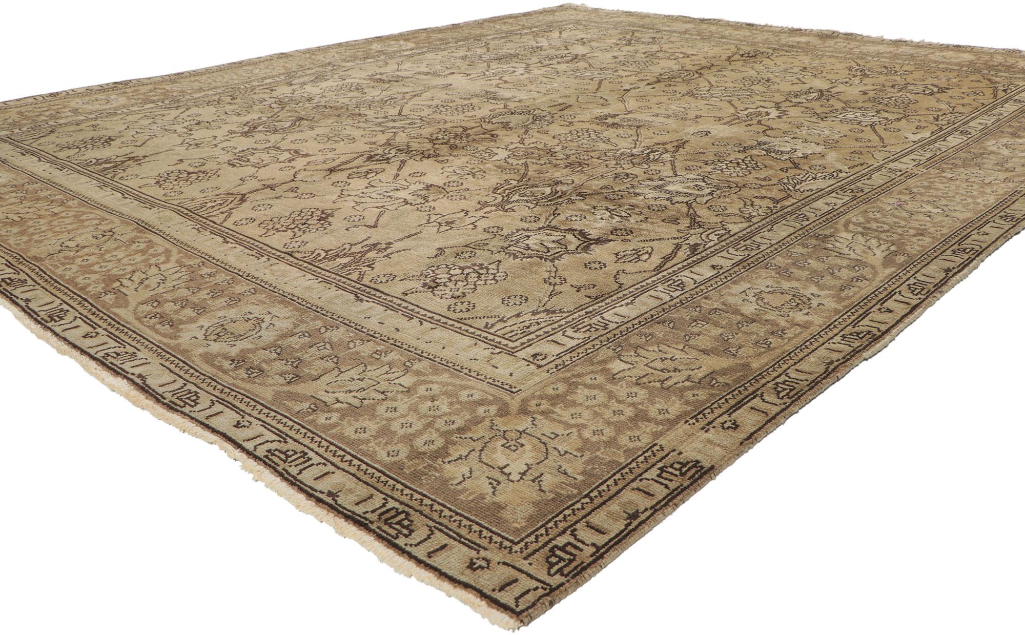 75529 vintage Persian Tabriz rug with traditional style. This hand-knotted wool vintage Persian Tabriz rug features an allover pattern surrounded by a classic border creating a well-balanced and timeless design. This vintage Persian Tabriz rug
