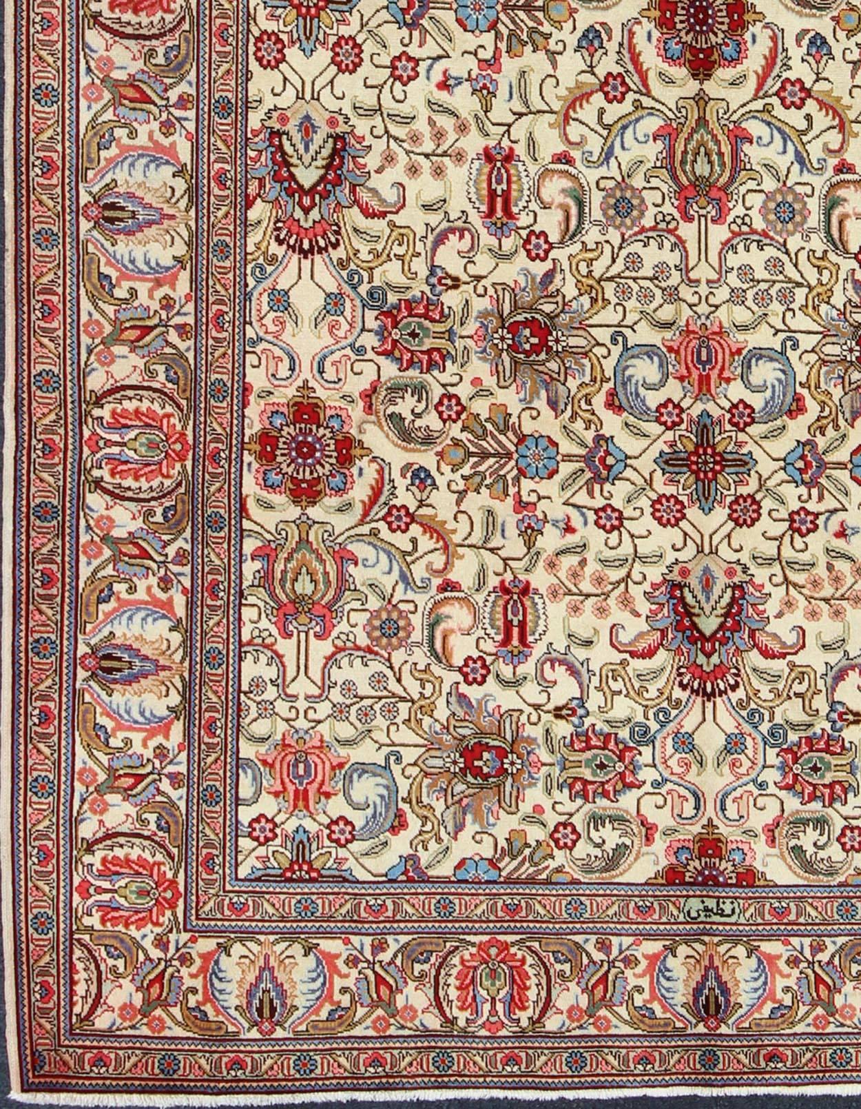 This Persian carpet features vivid, traditional colors and an all-over design set on an ivory background.
Measures: 8.4 x 11.8.
