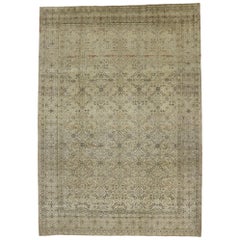 Vintage Persian Tabriz Rug with Warm Colors and Islamic Geometric Pattern