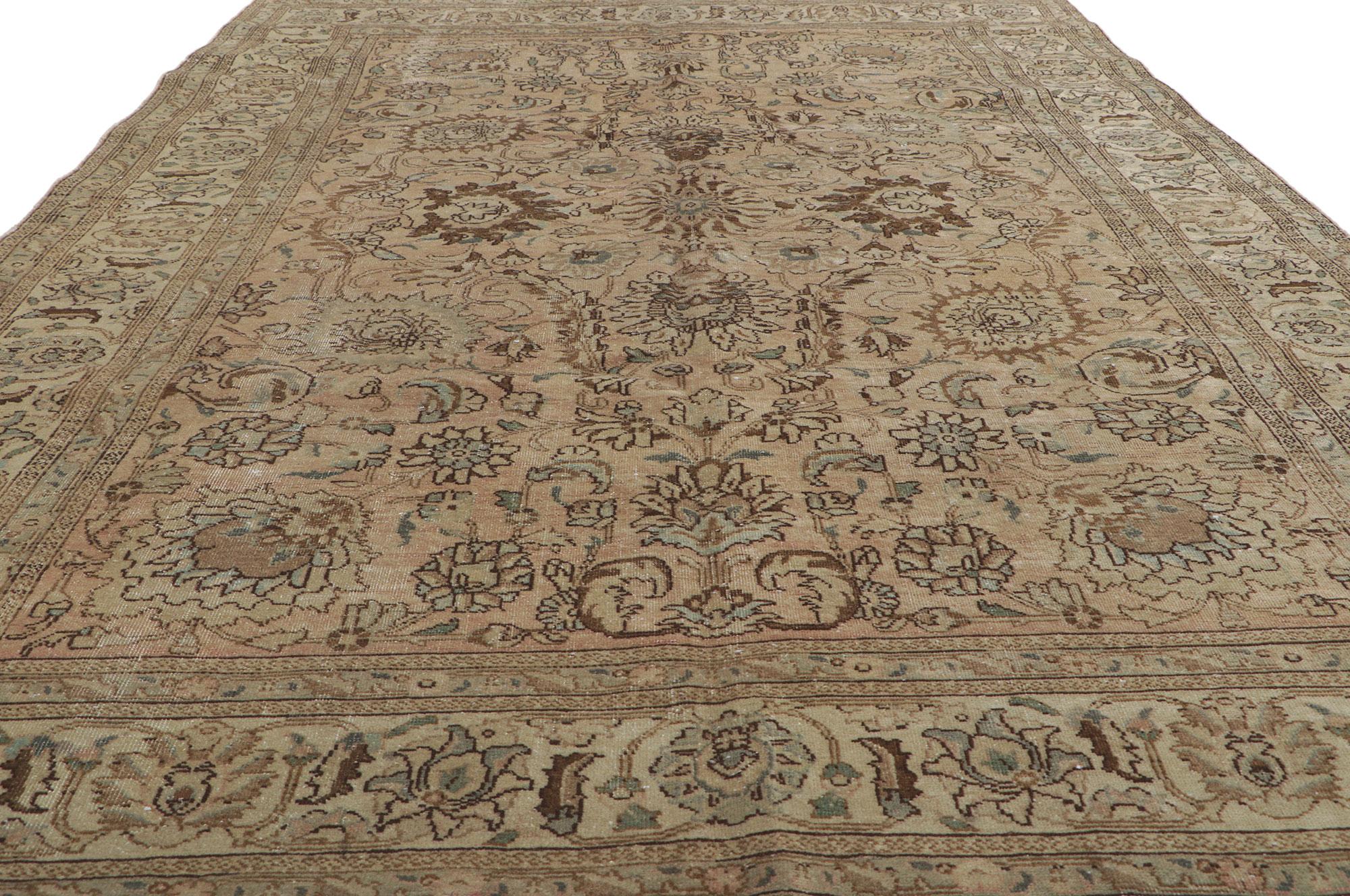 Hand-Knotted Vintage Persian Tabriz Rug with Warm Earth-Tone Colors For Sale