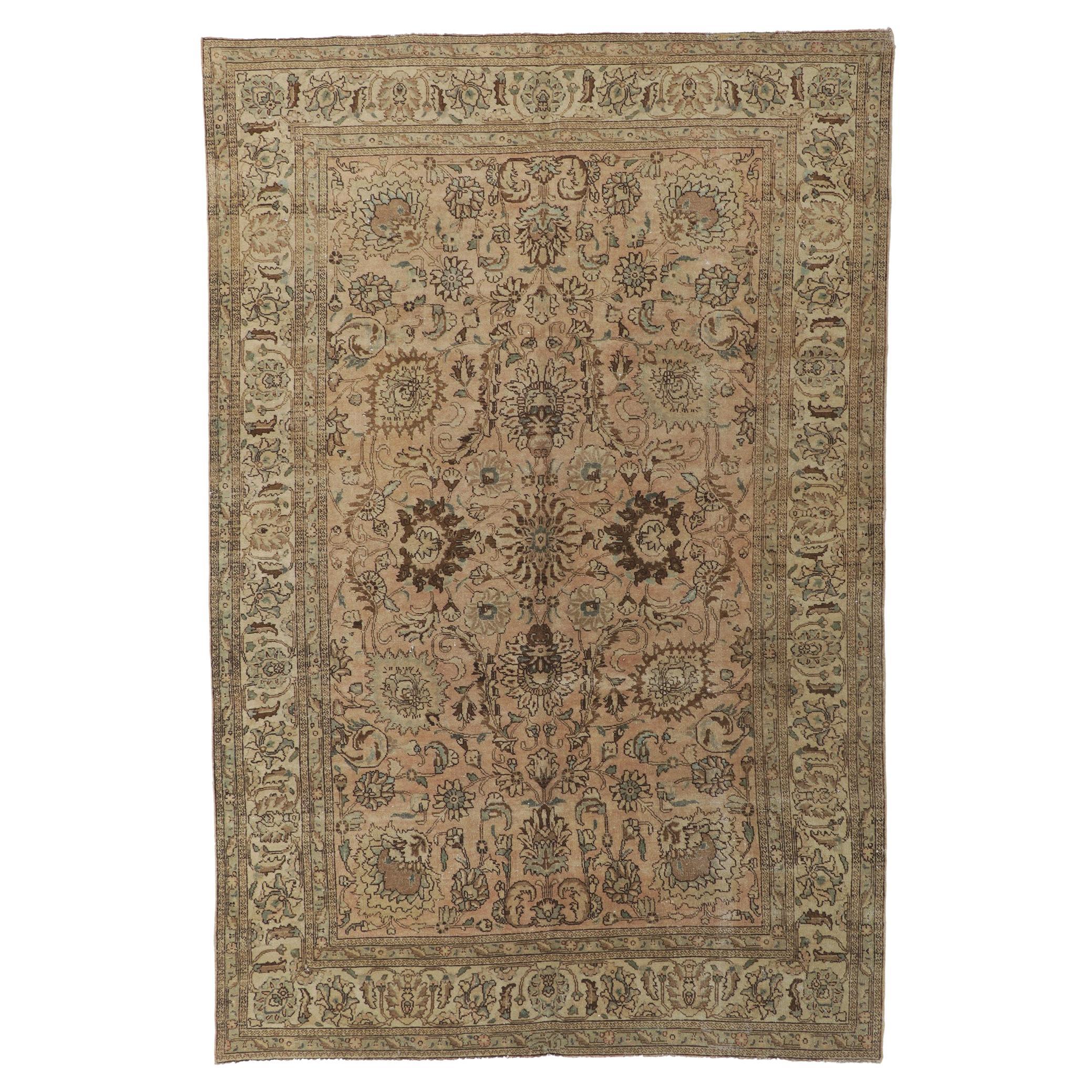 Vintage Persian Tabriz Rug with Warm Earth-Tone Colors For Sale