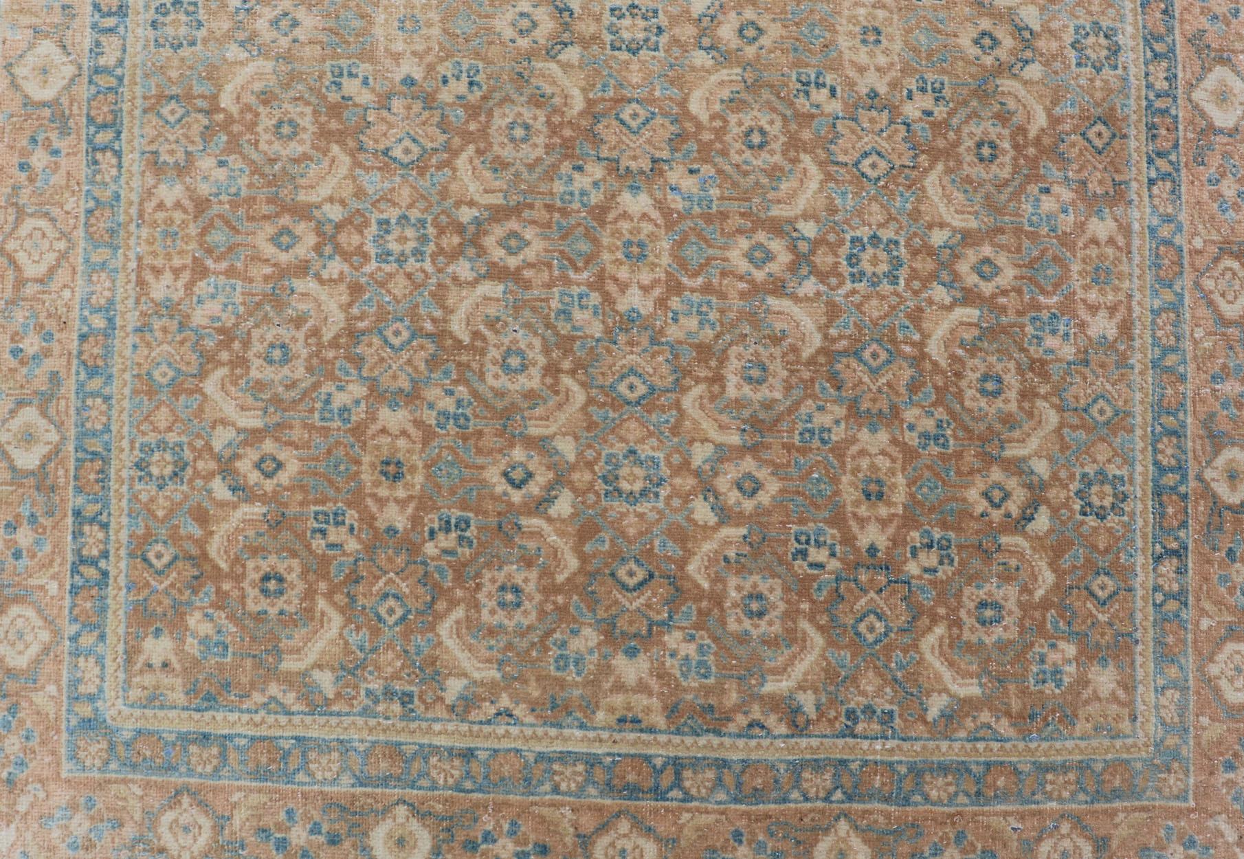 Measures: 3'4 x 11'0 
Vintage Persian Tabriz Runner with All-Over Floral Design in Tan and Blue. Keivan Woven Arts / rug EN-14502, country of origin / type: Iran / Tabriz, circa 1950

This Persian runner with a sophisticated, all-over design