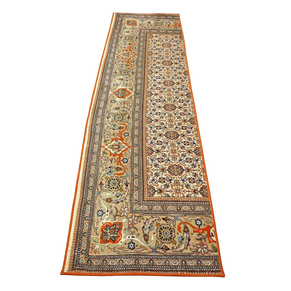 Ashly Fine Rugs presents a 1980s Vintage Persian Tabriz Taba Wool 3x10 Handmade Runner. Tabriz is a northern city in modern-day Iran and has forever been famous for the fineness and craftsmanship of its handmade rugs. This runner, along with 3