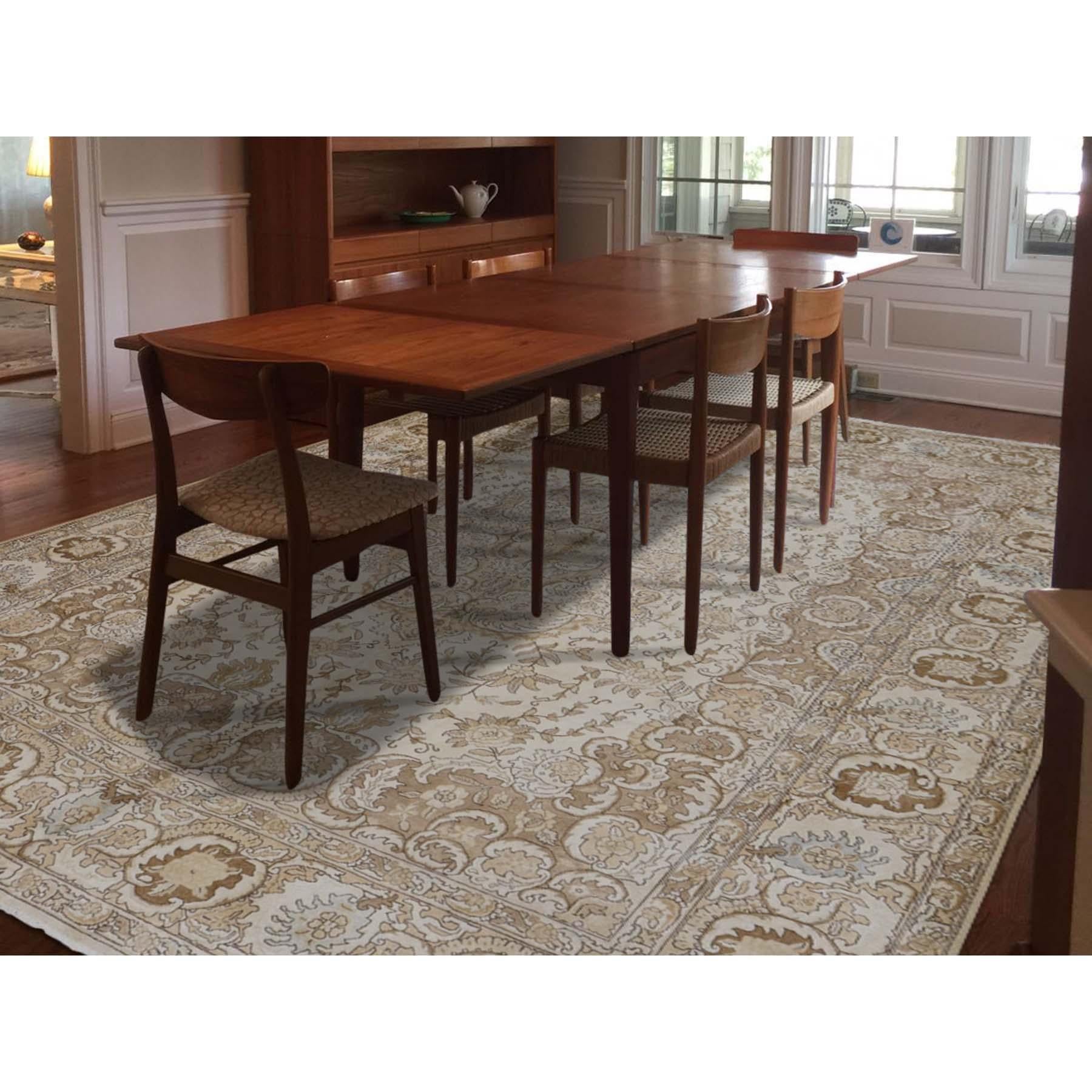 This fabulous hand knotted carpet has been created and designed for extra strength and durability. This rug has been handcrafted for weeks in the traditional method that is used to make rugs. This is truly a one of kind piece.

Exact rug size in