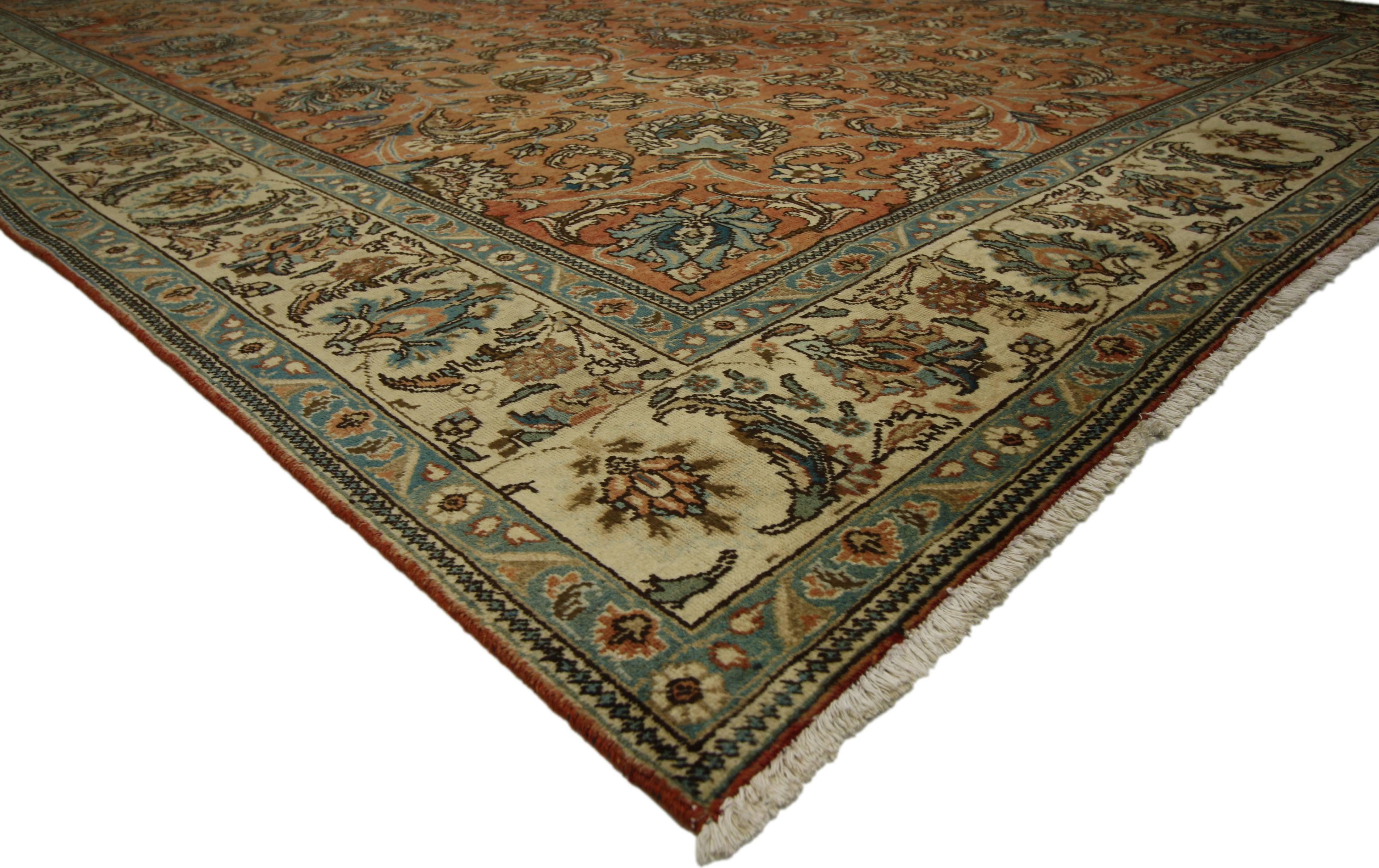 76281, vintage Persian Tabriz with traditional style. This hand-knotted wool vintage Persian Tabriz rug features an allover pattern surrounded by a classic border creating a well-balanced and timeless design. This vintage Persian Tabriz rug brings a