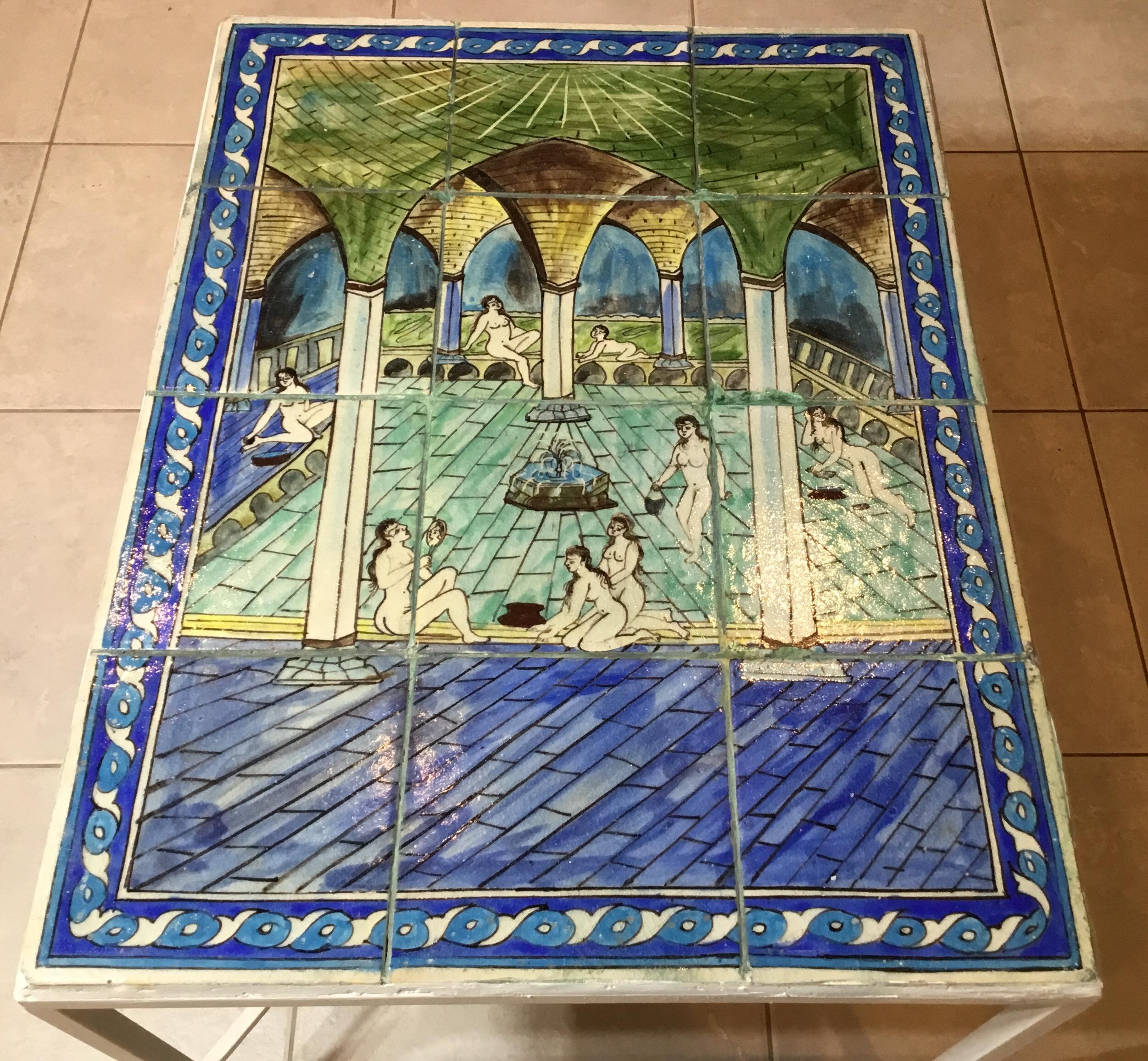 Exceptional coffee table made of set of six vintage ceramic tile hand painted and glazed, of nude woman in pool palace scenery, decorative architectural ceiling structure with columns, water fountains, and turquoise color pool. Solid steel base and