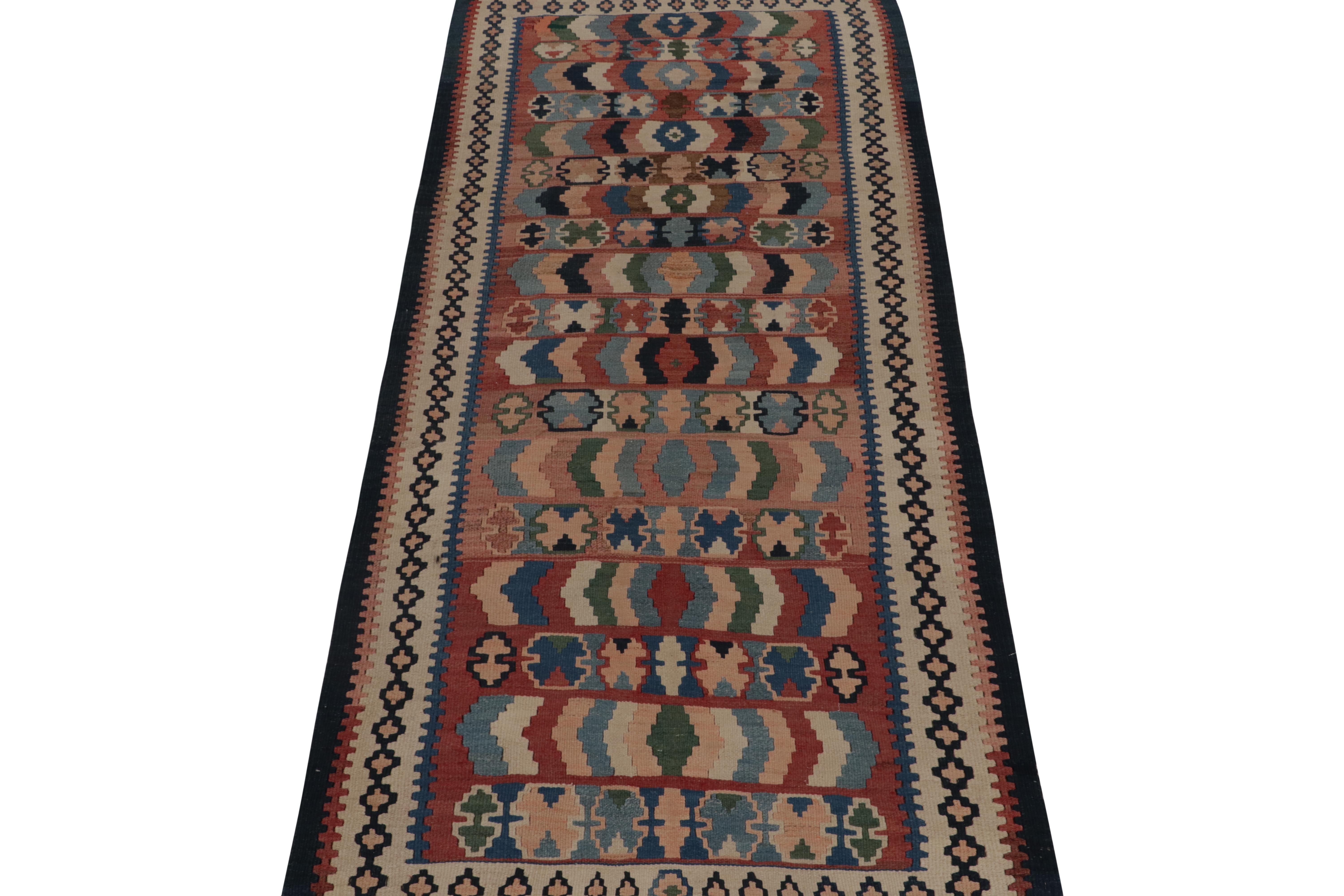 This vintage 4x10 Persian kilim is a mid-century gallery rug—handwoven in wool circa 1950-1960.

Further on the Design:

The intricate design enjoys a polychromatic colorway with rippling geometric patterns, gorgeous to behold in these