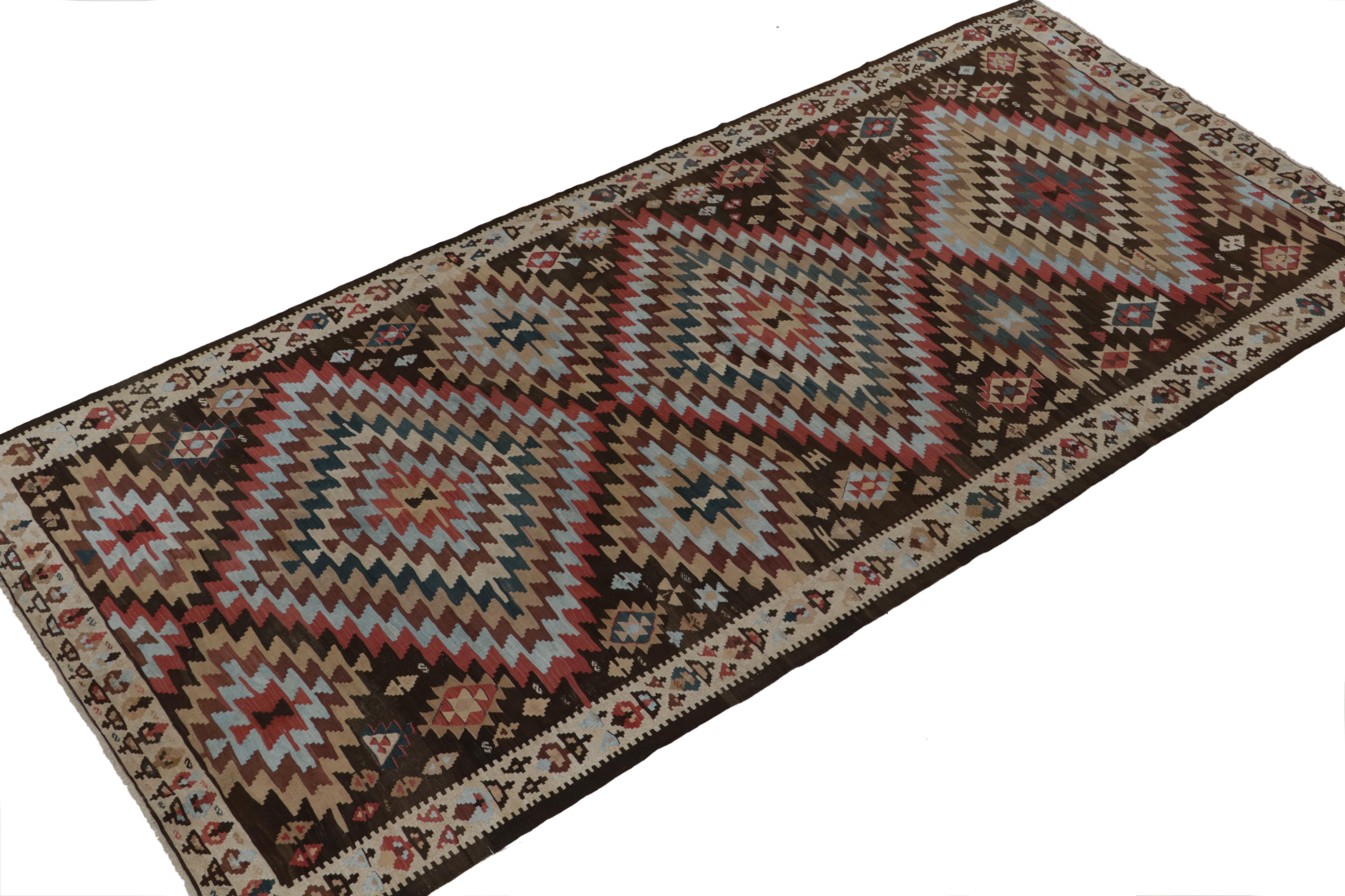 Hand-Knotted Vintage Persian Tribal Kilim in Polychromatic Geometric Patterns by Rug & Kilim For Sale
