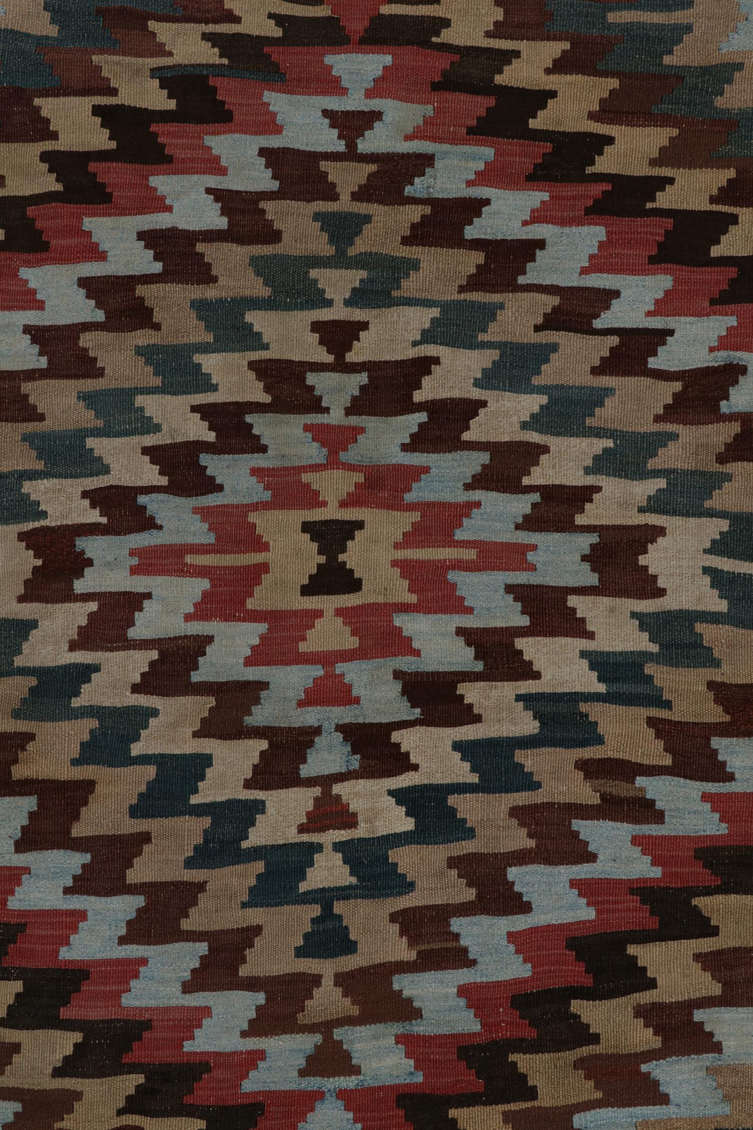 Wool Vintage Persian Tribal Kilim in Polychromatic Geometric Patterns by Rug & Kilim For Sale