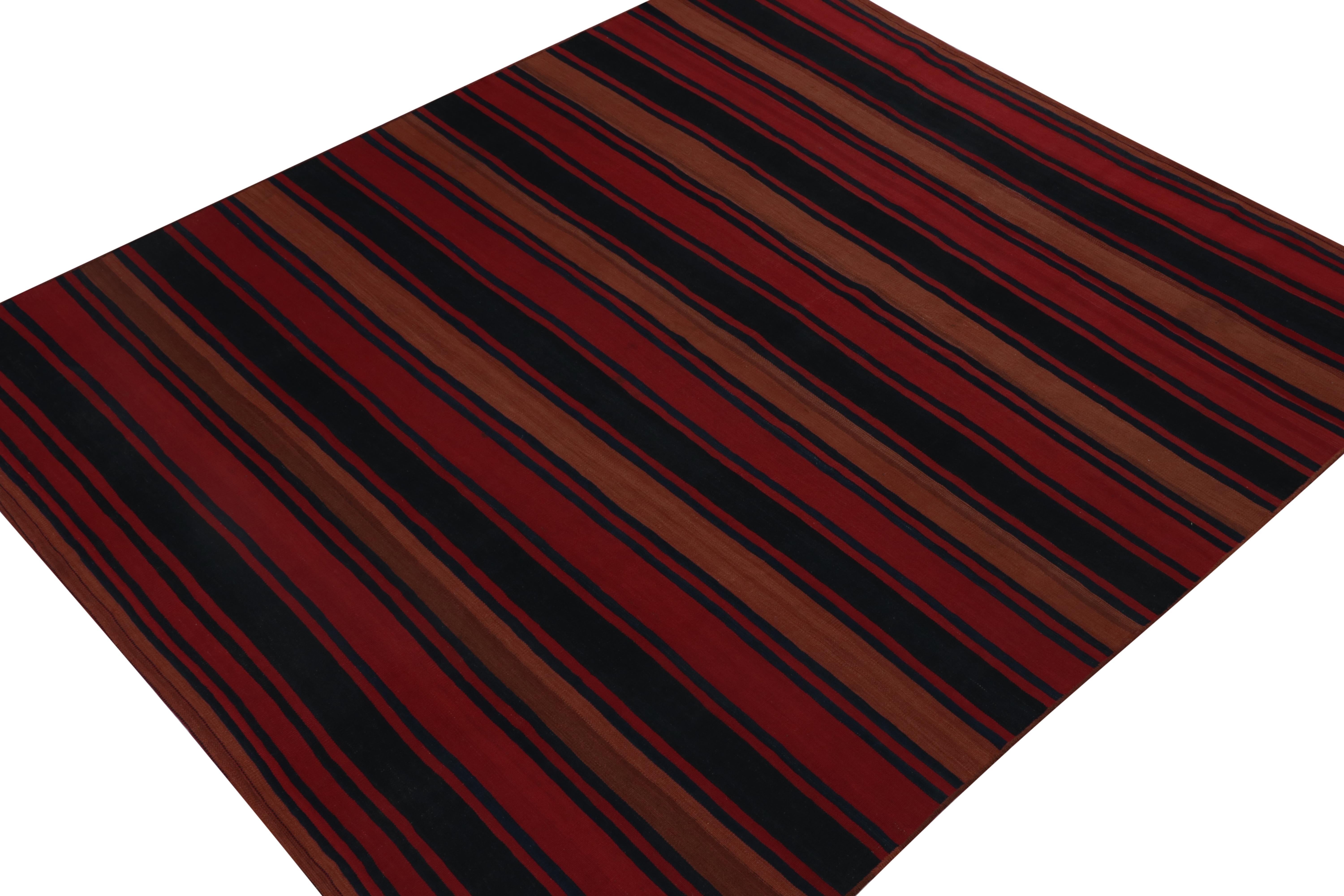 A vintage 8x9 kilim rug from Persia, handwoven in wool circa 1950-1960.

Further on the Design:

The simple design prefers rich red, midnight blue and brown stripes in rust tones of the most complementary, warm presence. Keen eyes will further