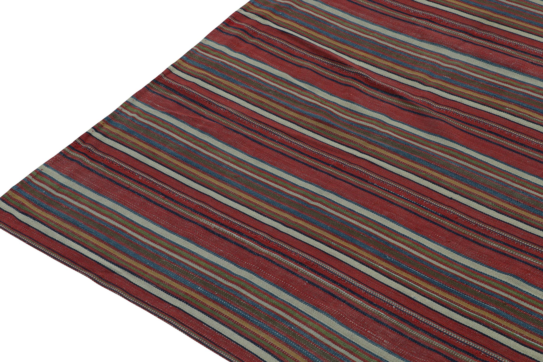 Mid-20th Century Vintage Persian Tribal Kilim in Red with Polychromatic Stripes, by Rug & Kilim  For Sale