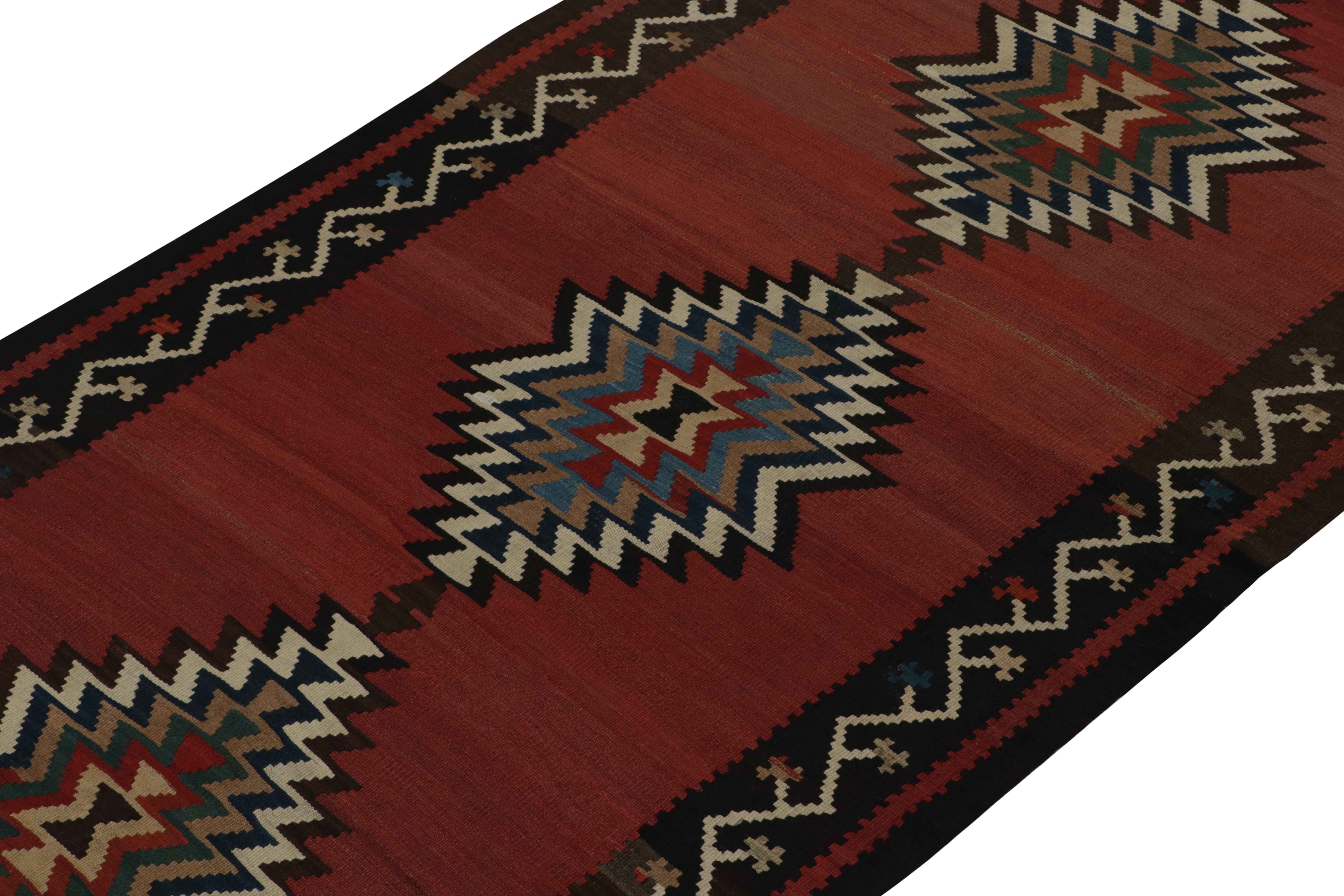 Vintage Persian Tribal Kilim rug in Polychromatic Patterns by Rug & Kilim In Good Condition For Sale In Long Island City, NY