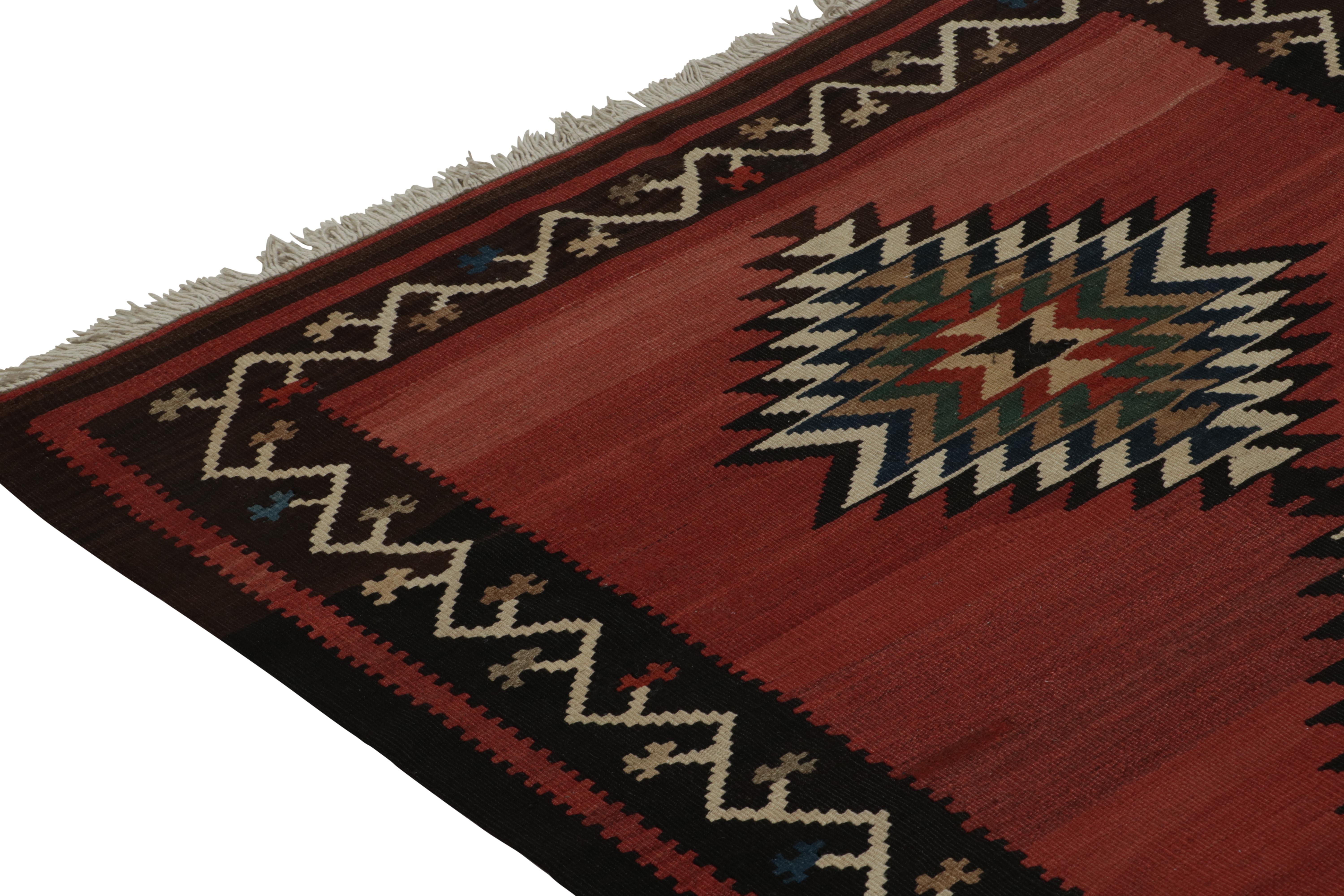 Mid-20th Century Vintage Persian Tribal Kilim rug in Polychromatic Patterns by Rug & Kilim For Sale