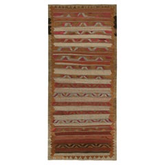 Tapis Kilim persan tribal vintage à rayures polychromes par Rug & Kilim
