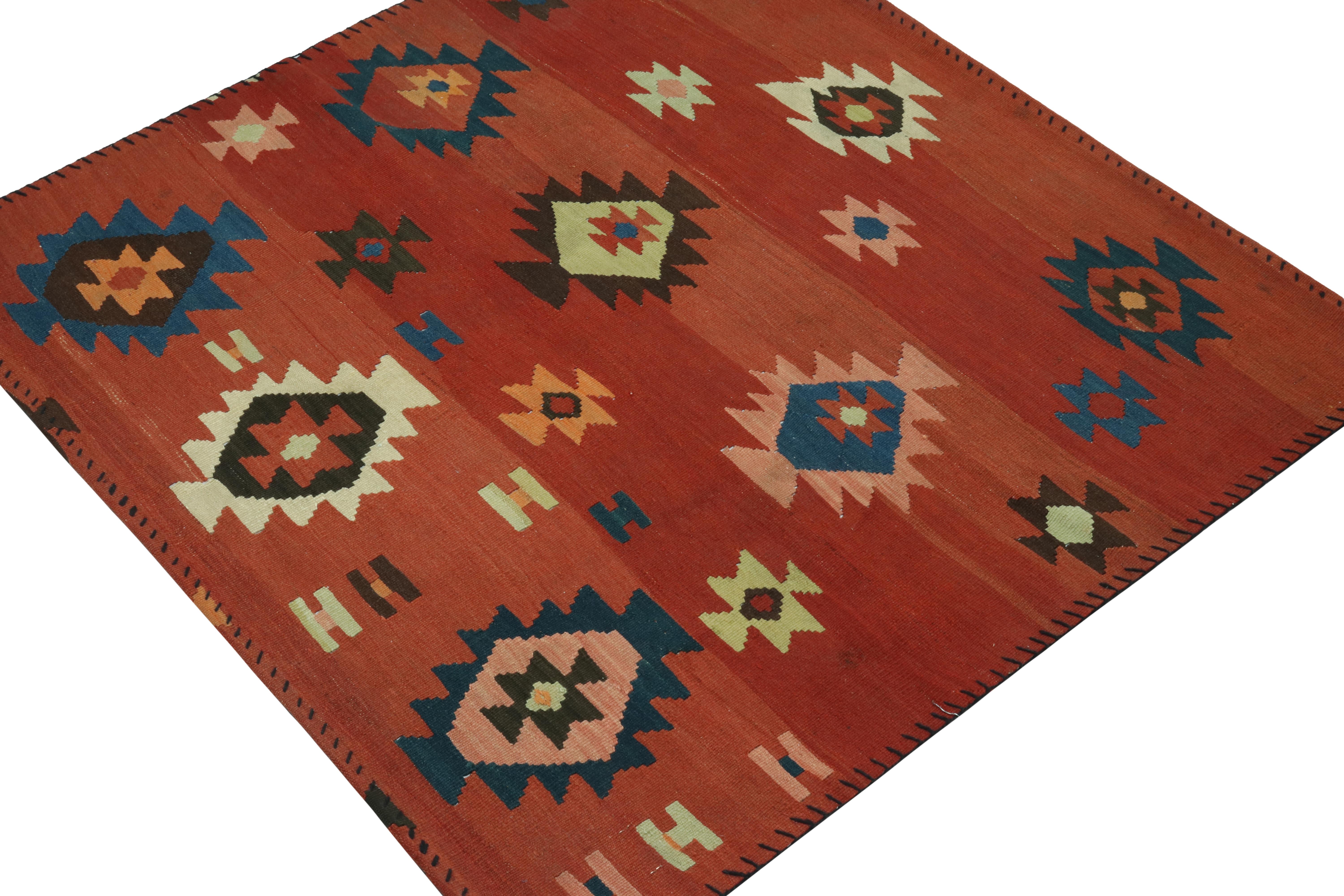 This vintage 3x3 Persian kilim is an Afghan tribal rug—handwoven in wool circa 1950-1960.

Further on the Design:

The design prefers warm colors in reds, oranges, and pinks like salmon and brick hues in its background. Keen eyes will admire navy