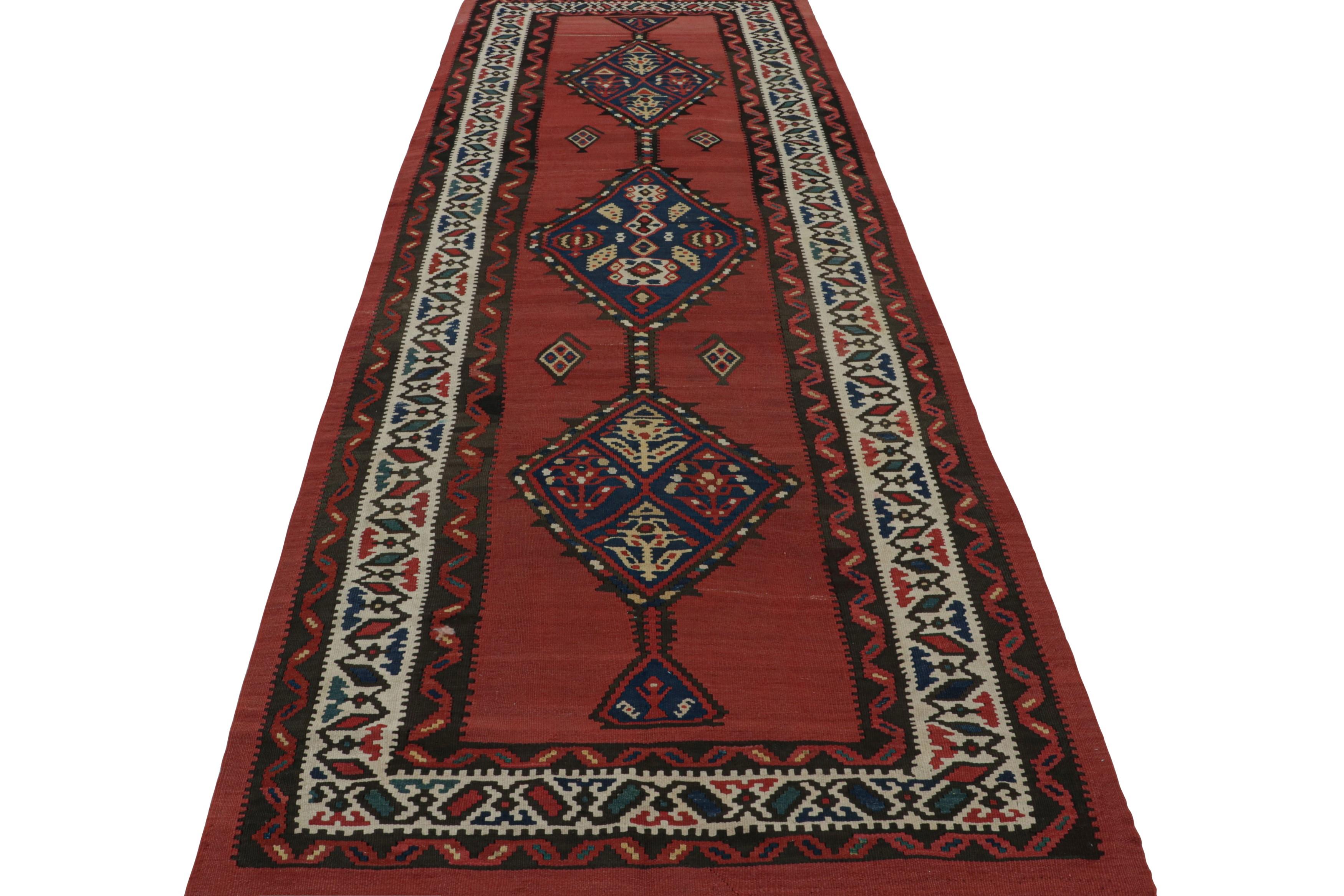 Tribal Vintage Persian tribal Kilim Runner rug with Medallions from Rug & Kilim For Sale