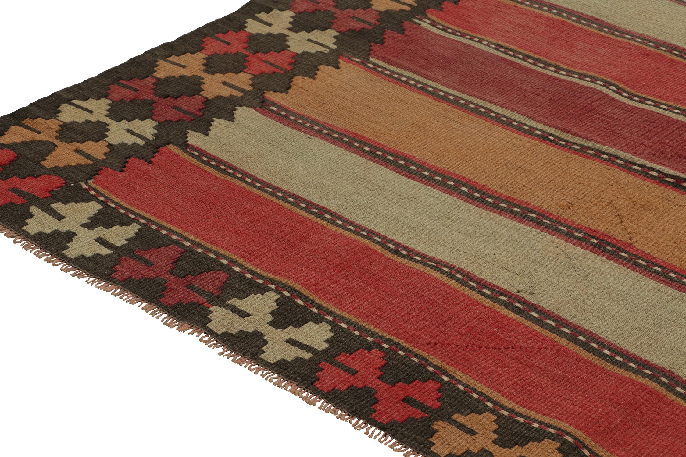 Mid-20th Century Vintage Persian Tribal Kilim with Stripes and Geometric Patterns by Rug & Kilim For Sale