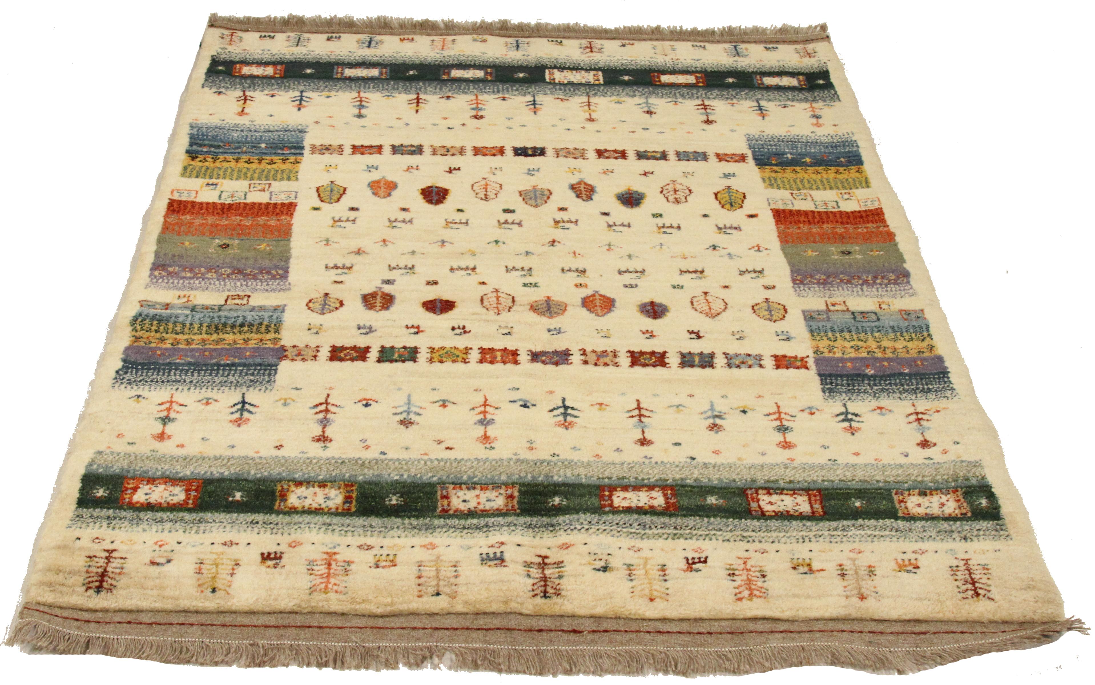 Vintage handwoven Persian rug made from fine wool and all-natural vegetable dyes that are safe for people and pets. This beautiful piece features simple geometric patterns which Gabbeh rugs are known for. Persian tribal rugs like Gabbeh are highly