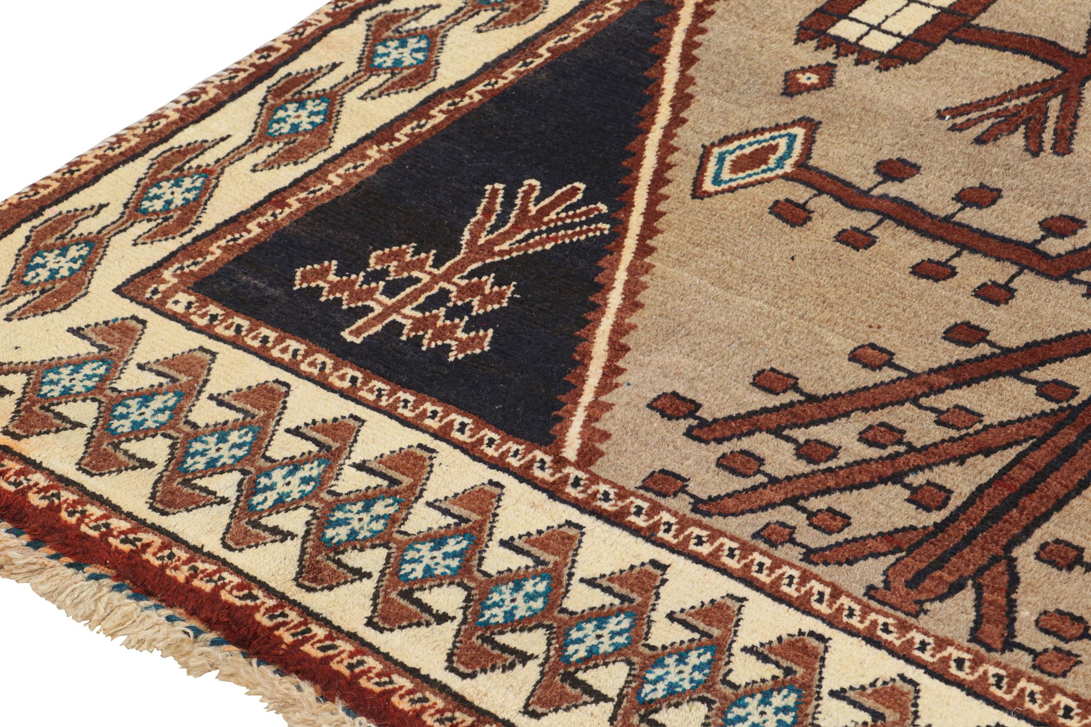 Mid-20th Century Vintage Persian Tribal rug in Beige with Brown Geometric Pattern For Sale