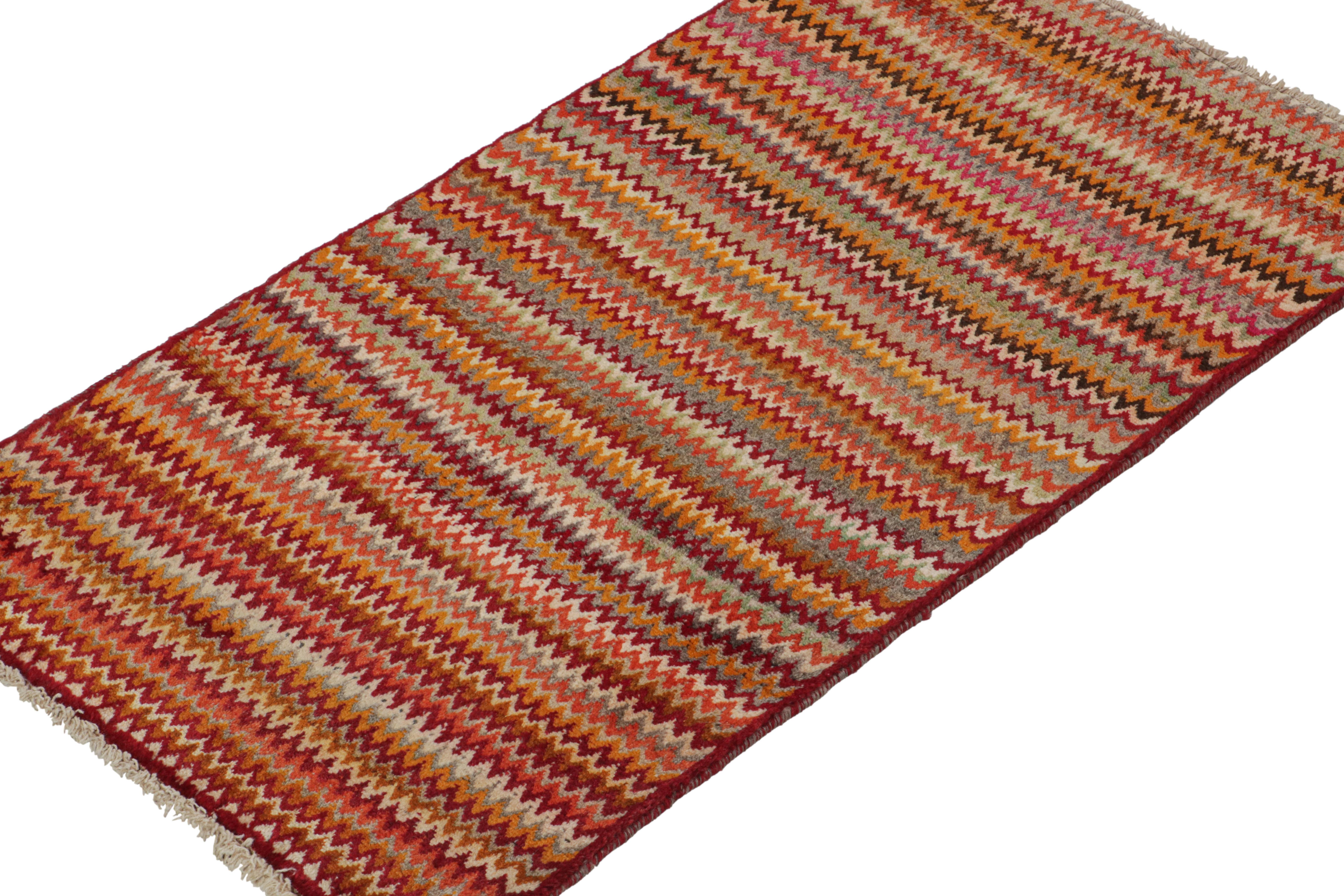 Hand-Knotted Vintage Persian Tribal Rug in Polychromatic Chevron Patterns by Rug & Kilim For Sale