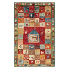 Tappeto tribale persiano vintage con pitture policrome di Rug & Kilim