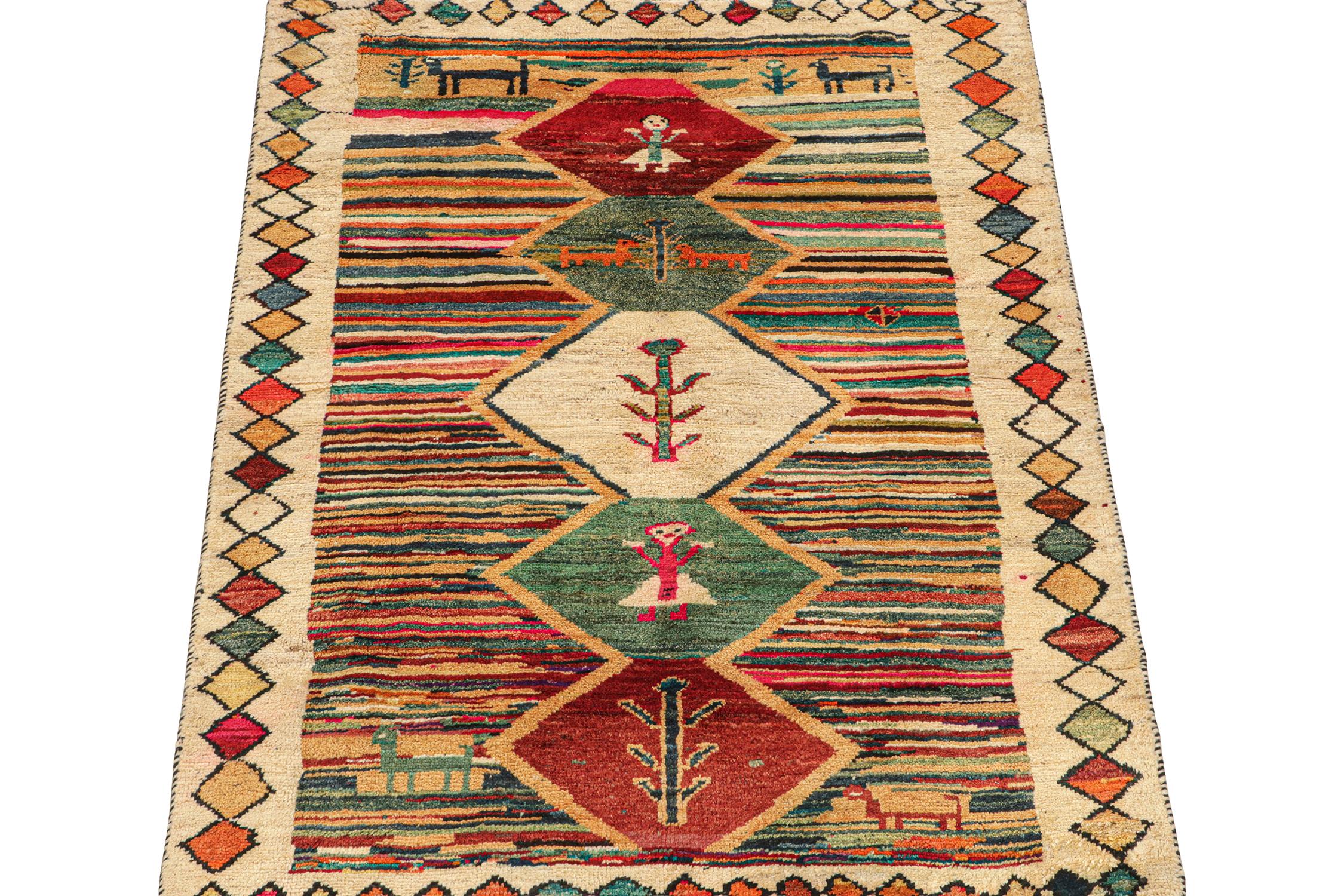 This vintage 4x6 Persian tribal runner is hand-knotted in wool, and originates circa 1950-1960.

On the Design:

The design enjoys a polychromatic field and medallion patterns with pictorial figures that depict primitivist human and animal