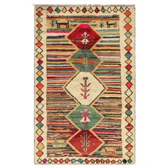 Persischer Stammeskunst-Teppich in lebhaften Farben mit malerischem Muster von Rug & Kilim