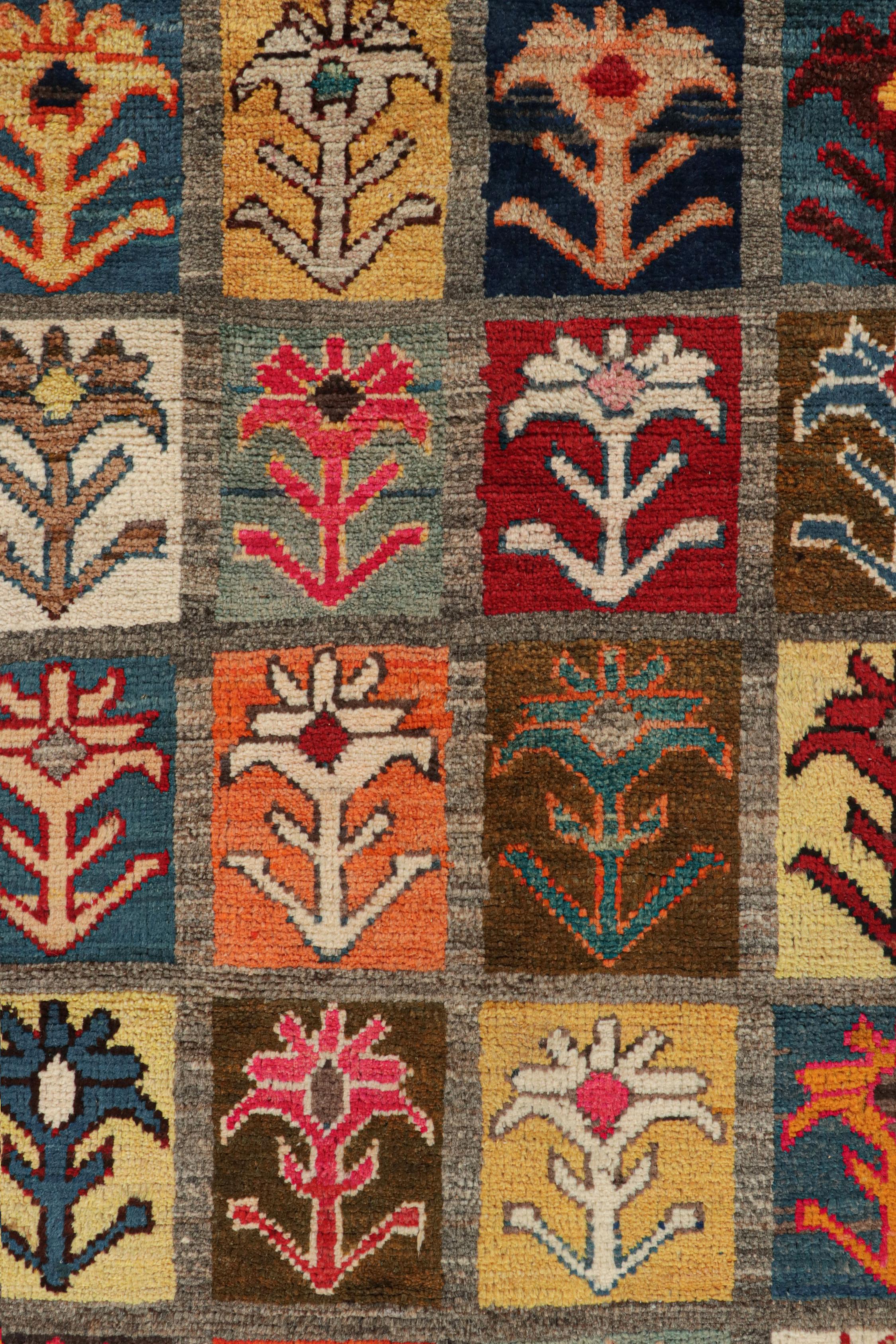 Mid-20th Century Vintage Persian Tribal Rug with Vibrant Geometric-Floral Patterns