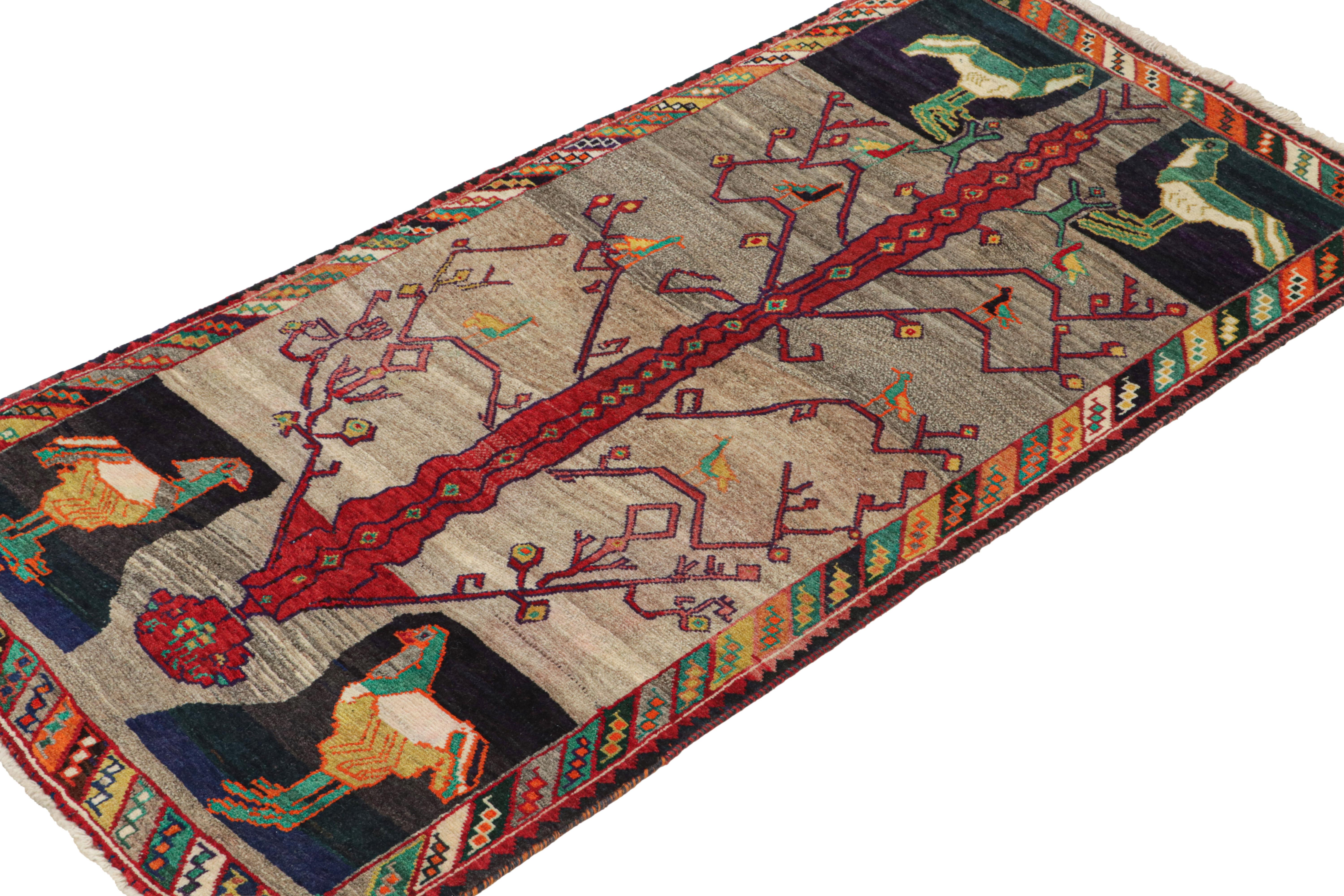 Hand-Knotted Vintage Persian Tribal Runner with Vibrant Pictorials For Sale