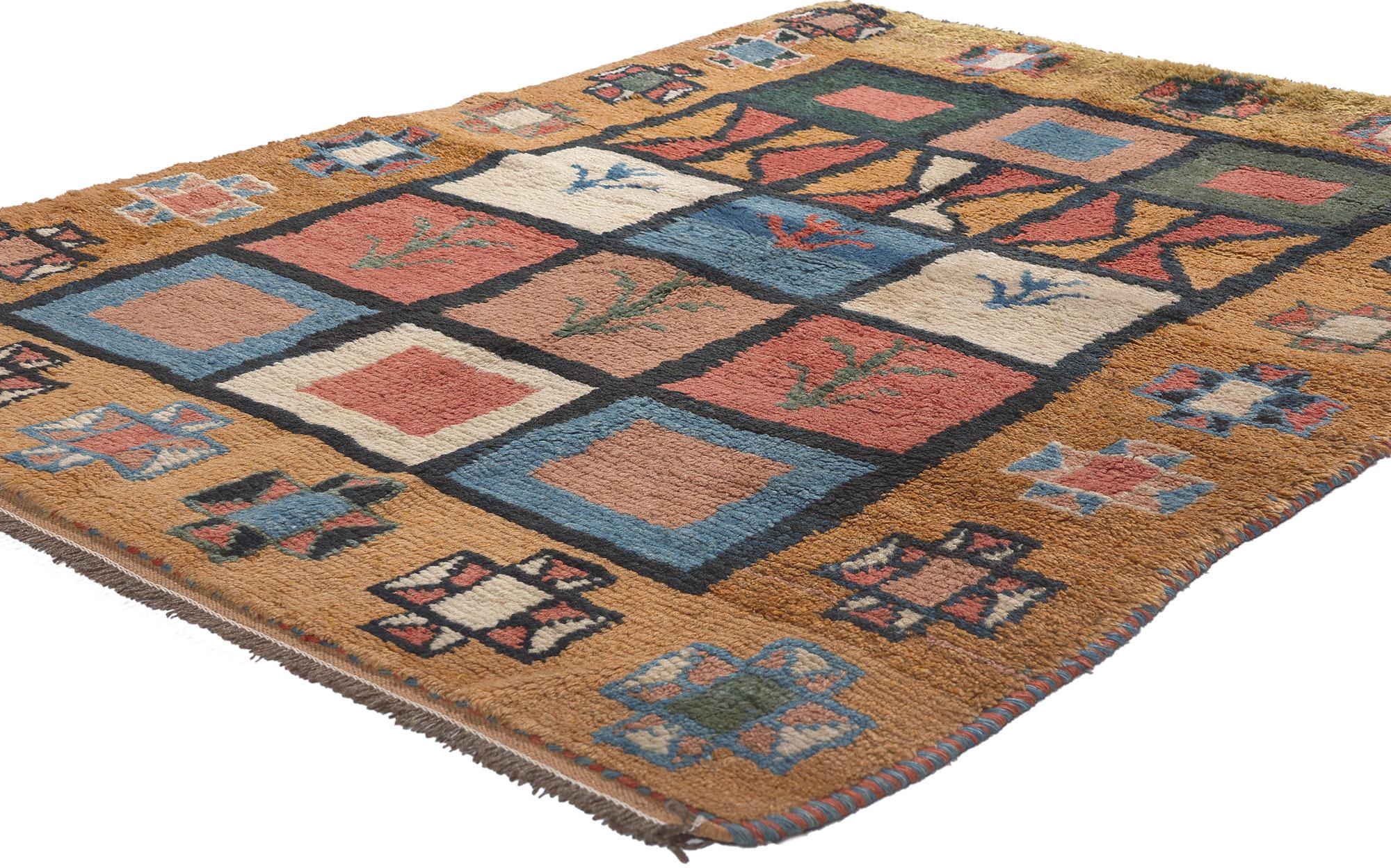 61247 Vintage Persian Shiraz Rug, 03'07 x 04'11.
Emanating nomadic charm with incredible detail and texture, this hand knotted wool vintage Persian Shiraz rug is a captivating vision of woven beauty. The tribal check pattern and earthy colorway