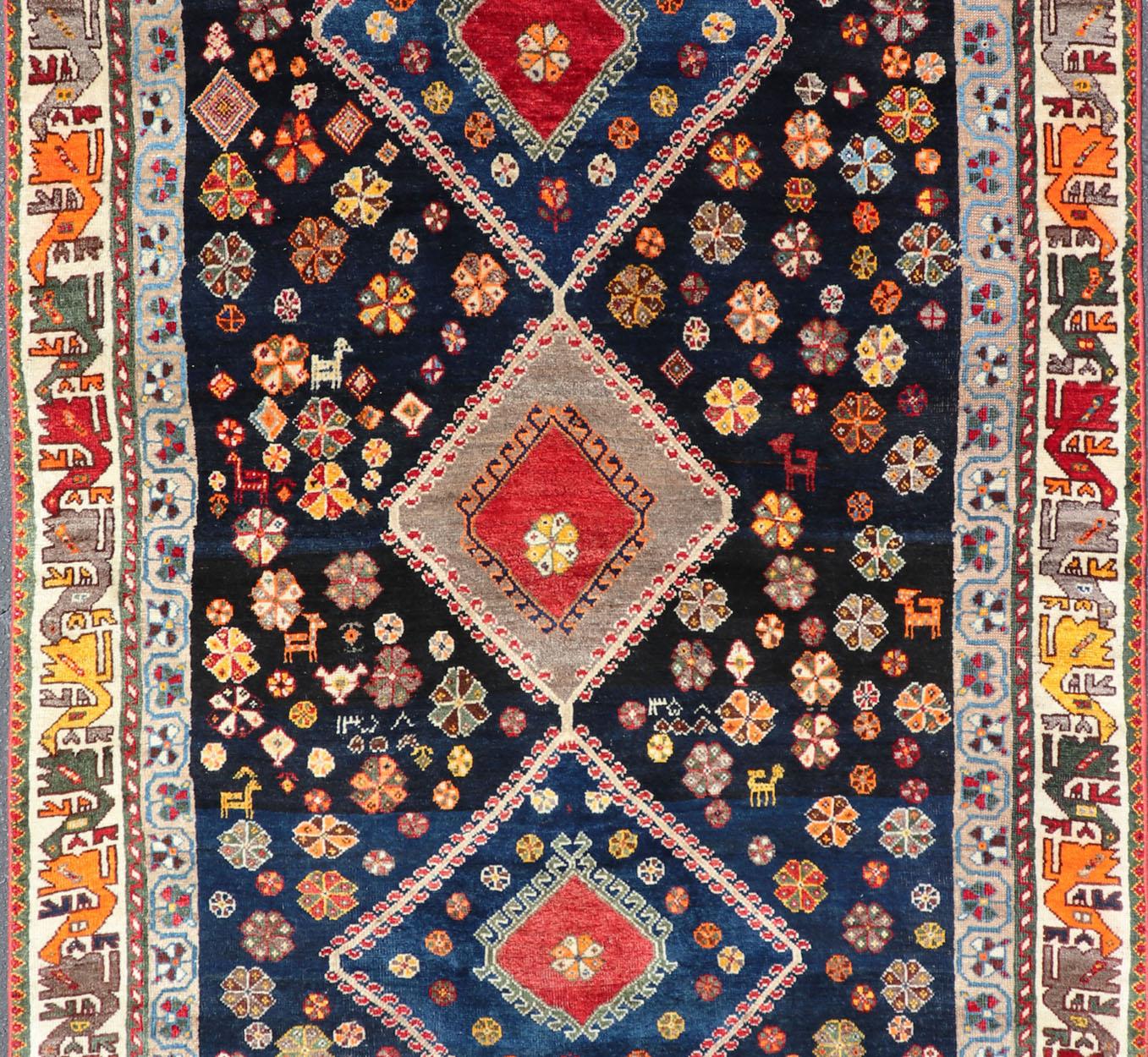 Hand-Knotted Vintage Persian Tribal Shiraz with Medallion Design on Dark Background