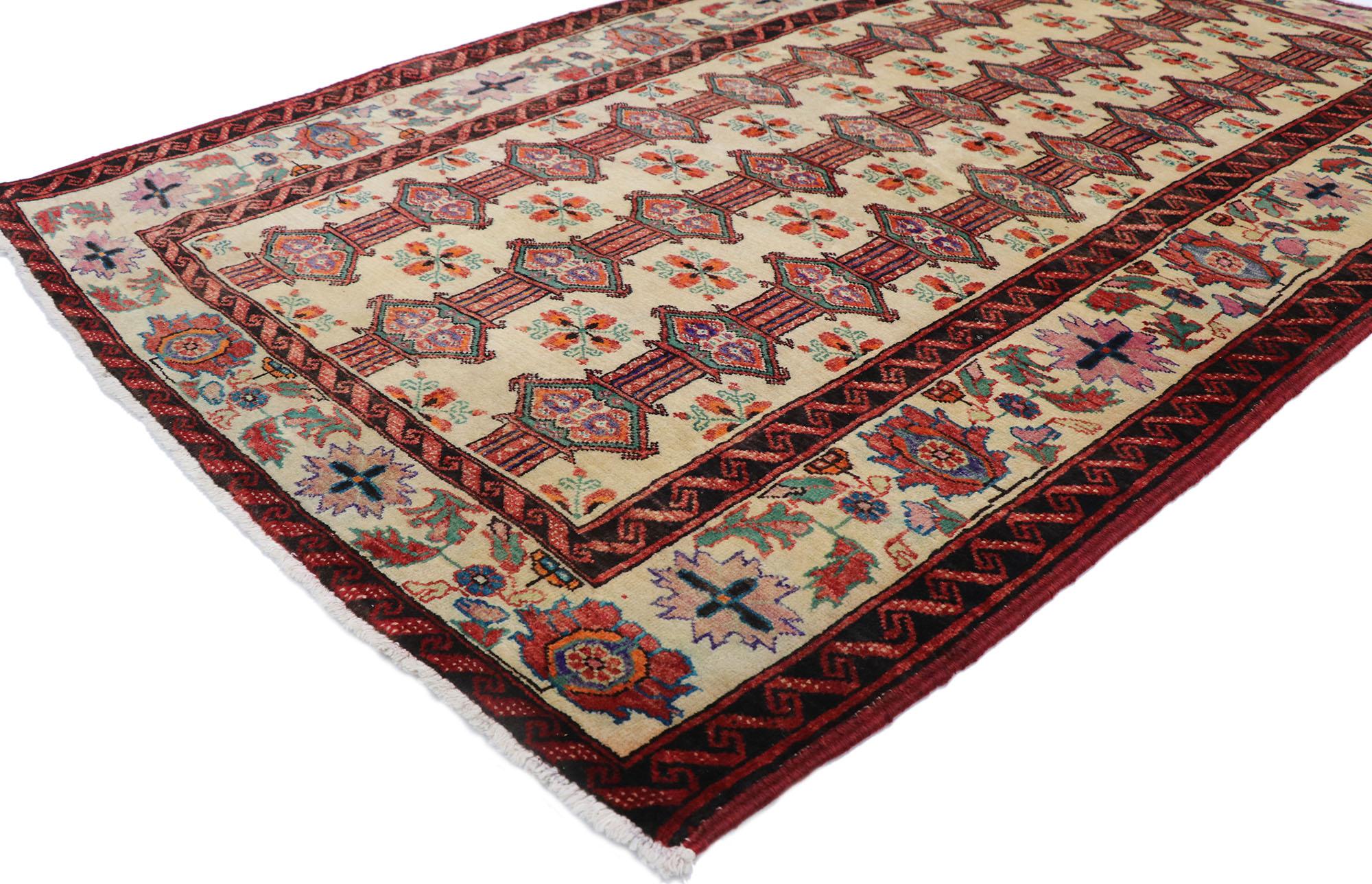 77717 Vintage Persian Turkaman rug with Tribal Style 03'08 x 05'08. Full of tiny details and a bold expressive design combined with lively colors and tribal style, this hand-knotted wool vintage Persian Turkaman rug is a captivating vision of woven
