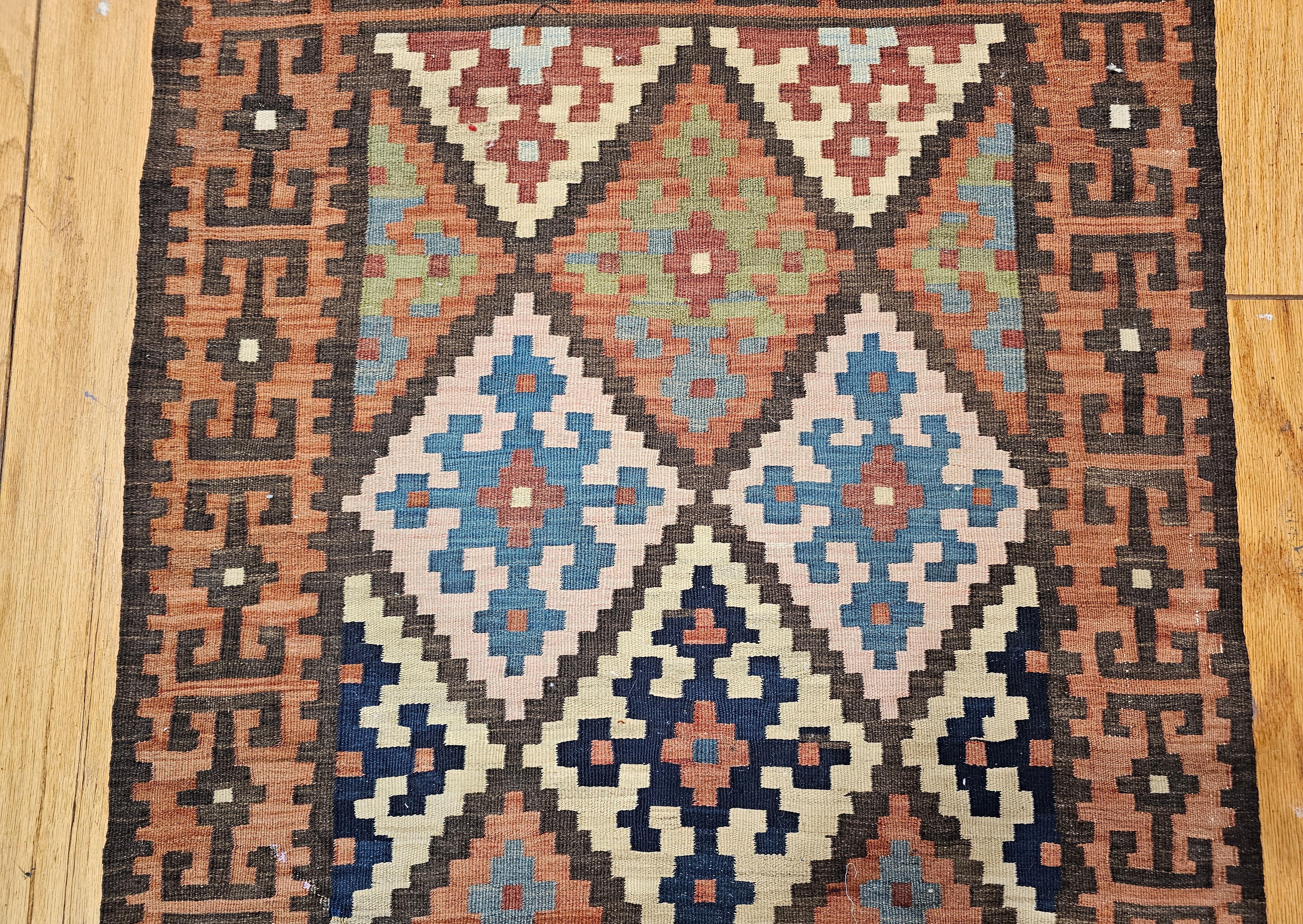 20th Century Vintage Persian Varamin Kilim Runner in Blue, Brown, Green, Yellow, Pink For Sale