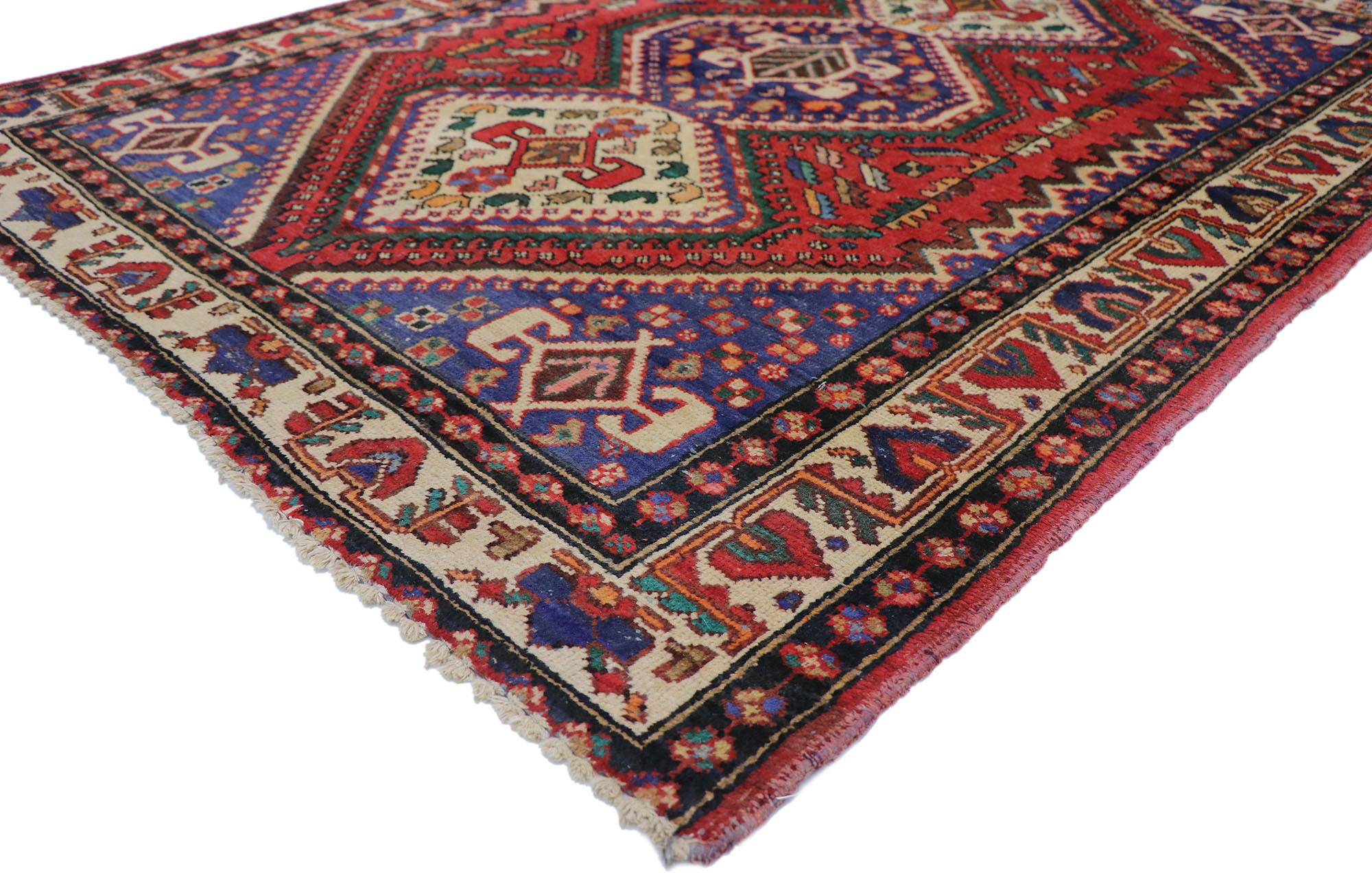 78086 vintage Persian Viss rug with Tribal style 05'04 x 06'08. Balancing tribal style and traditional sensibility with nomadic village charm, this hand knotted wool vintage Persian Viss rug is an amalgam of Caucasian influence. The abrashed red
