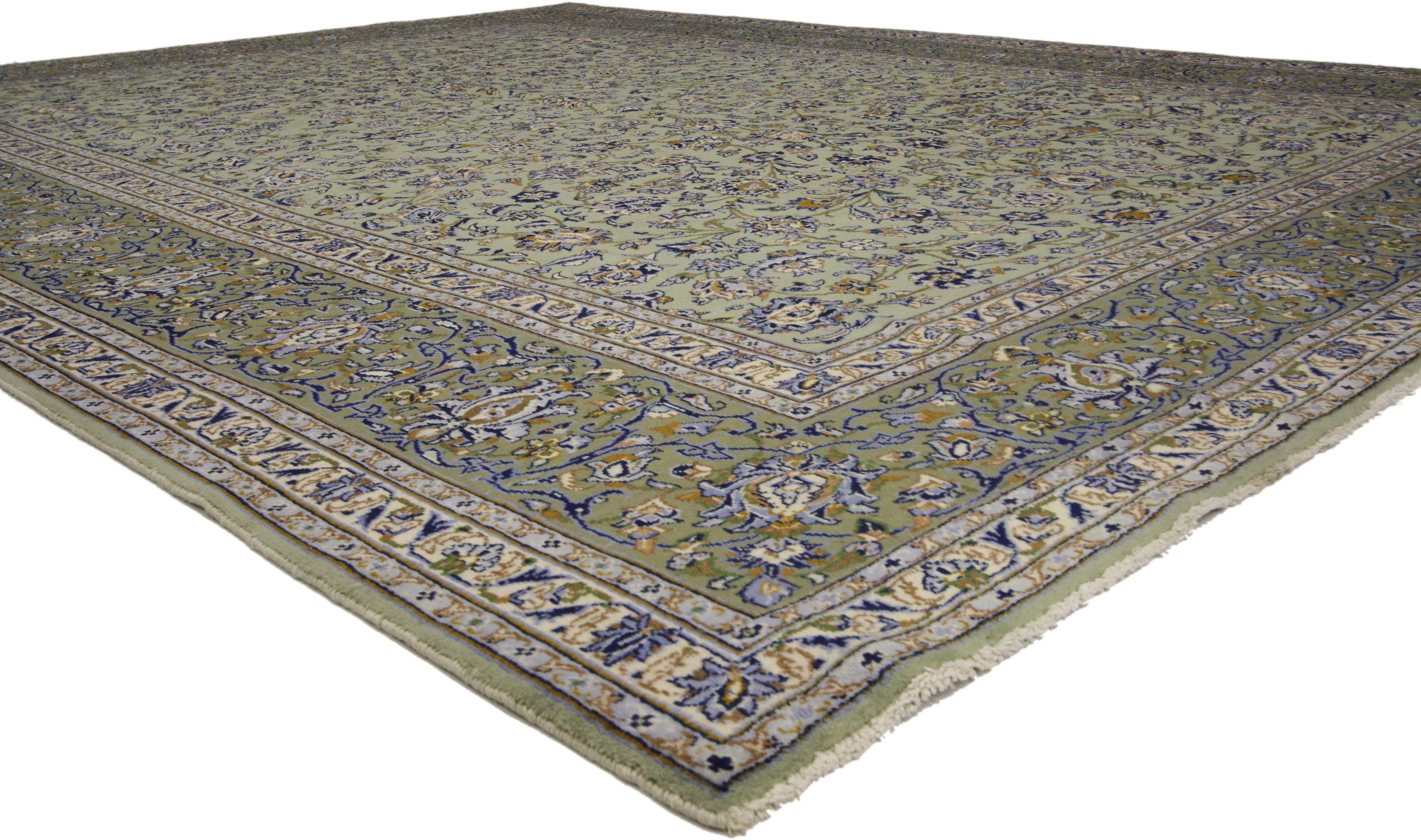 75922, Vintage Persian Yazd Area Rug with French Country Style 09'08 x 12'08. Bursting with a floral abundance in a myriad of colors, this Vintage Persian Yazd rug features an endlessly fascinating allover pattern against an abrash Ed celadon