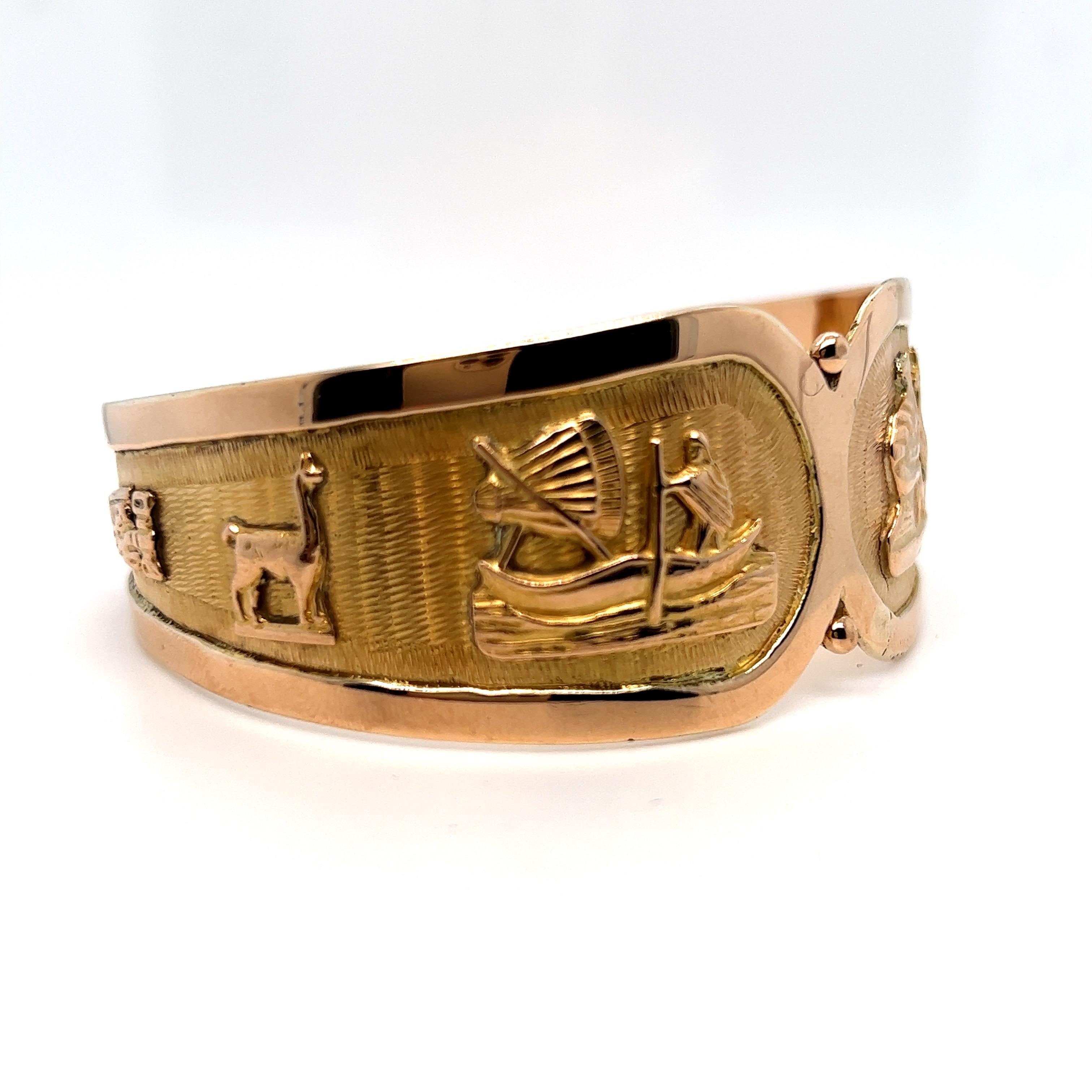 Wow wow wow. 

This Peruvian 18K Yellow Gold Bangle Bracelet is so gorgeous, and so unique. Crafted in 18K Yellow Gold, the figural design features llamas, a flute player, and an amazing hand etched wheat patterned background. Truly one of a kind. 