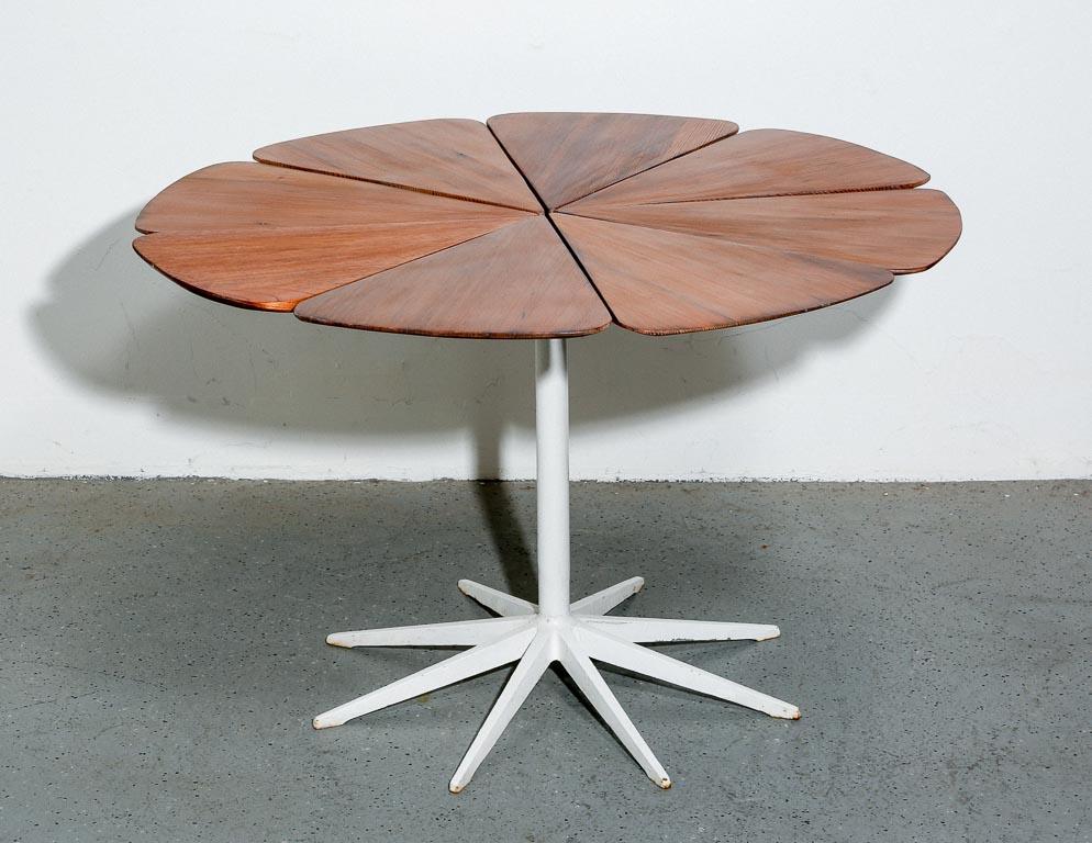 Vintage 'Petal' dining table designed by Richard Schultz for Knoll, c. 1960. Top is made up of a ray of solid cedar petals with a base and stem made of cast aluminum and steel.