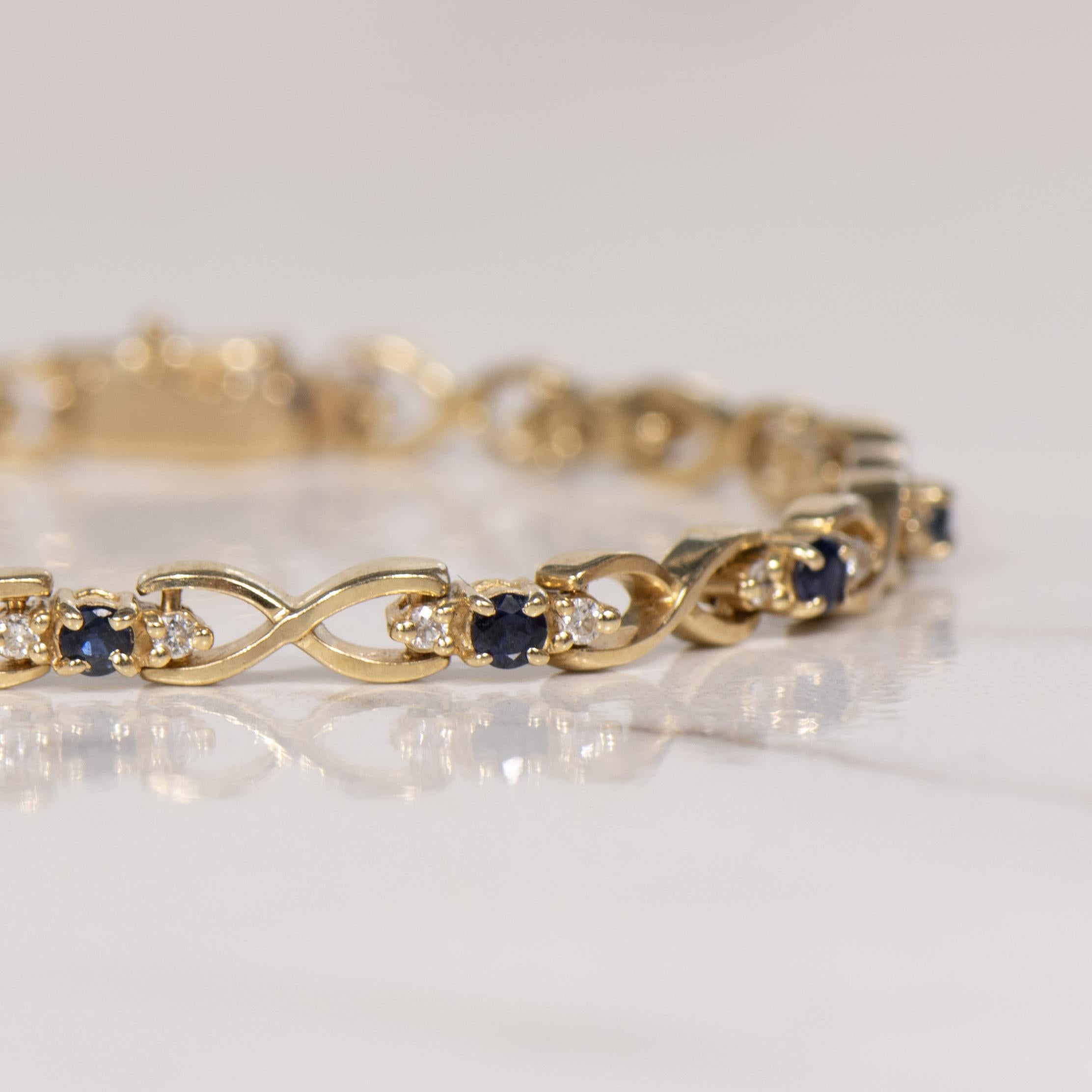 Kleines Vintage-Armband mit Diamanten und Saphiren (Rundschliff)