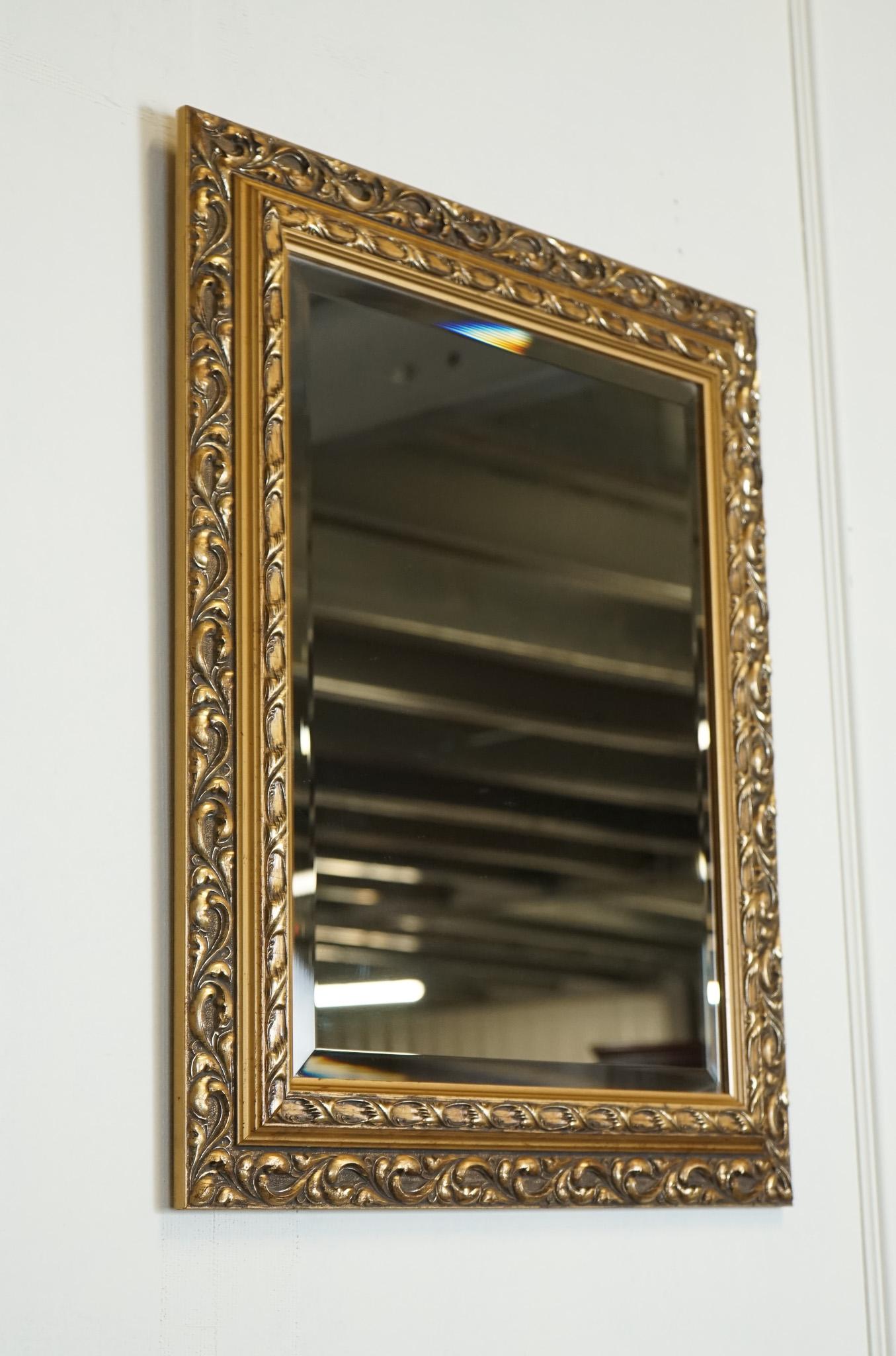 Antiques of London



We are delighted to offer for sale this Lovely Vintage Gold Ornate Mirror.

A vintage petite gold ornate bevelled mirror is a stunning piece that exudes opulence and elegance. This type of mirror is typically smaller in size,