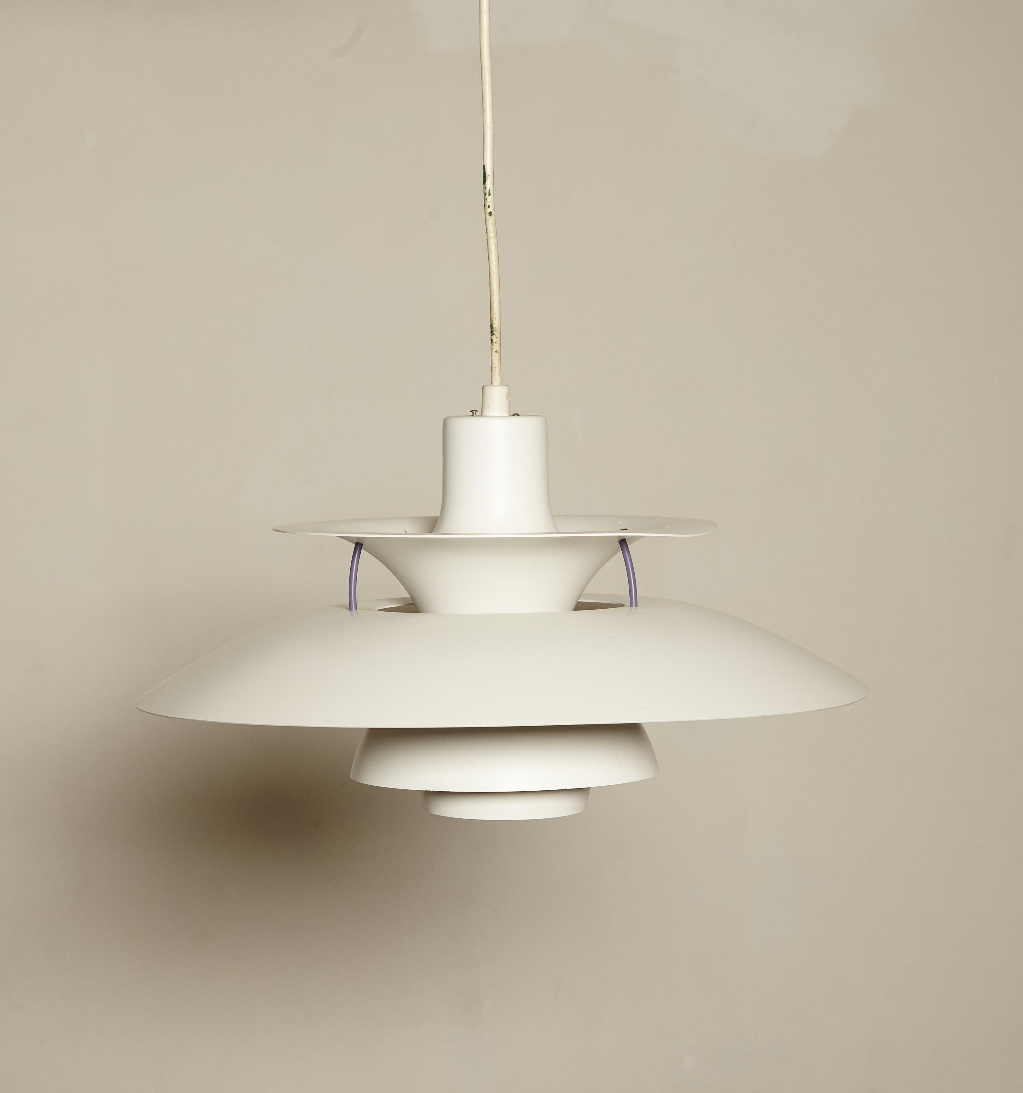 A Classic vintage PH5 pendant lamp by Poul Henningsen for Louis Poulsen, Denmark. Diameter 50 cm. A pair is available.  Manufacturers label present.    Ships worldwide.

  