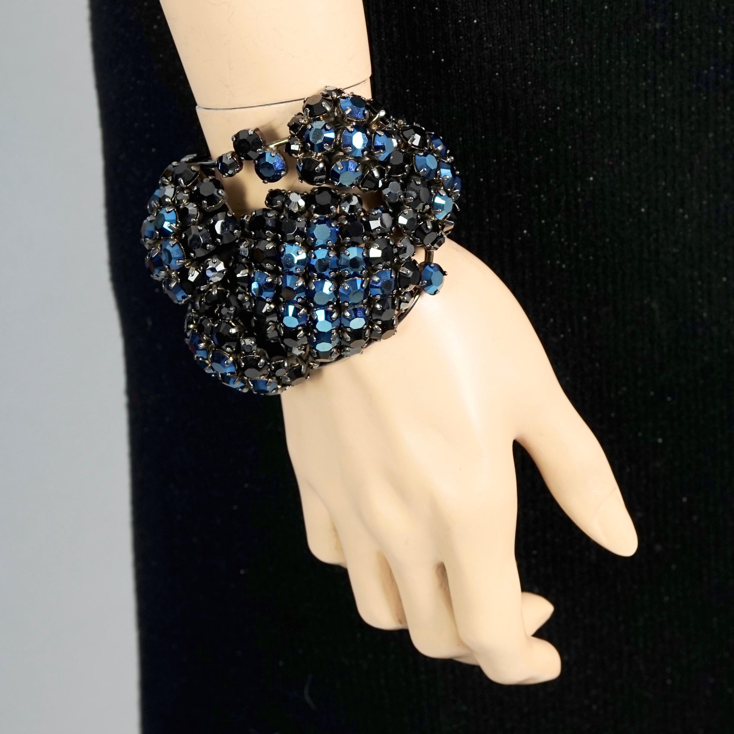 Vintage PHILIPPE FERRANDIS Dramatic Crystal Wide Cuff Bracelet

Measurements:
Height: 2.75 inches (7 cm)
Wearable Length: 6.89 inches (17.5 cm) opening included

Features:
- 100% Authentic PHILIPPE FERRANDIS.
- Dramatic cuff bracelet studded with