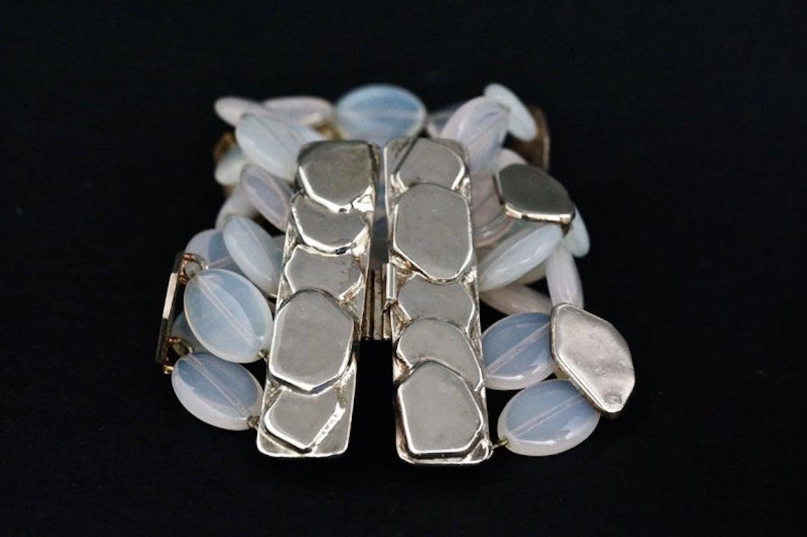 Vintage PHILIPPE FERRANDIS Moonstone Layered Wide Bracelet

Measurements:
Height: 2 5/8 inches
Wearable Length: 7 2/8 inches

Features:
- 100% Authentic PHILIPPE FERRANDIS.
- 5 layers of oval moonstones.
- Geometric metal accents.
- Silver tone.
-