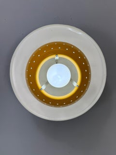 Vintage Philips Netherlands Perforated Yellow Ceiling or wall Lamp 1970s