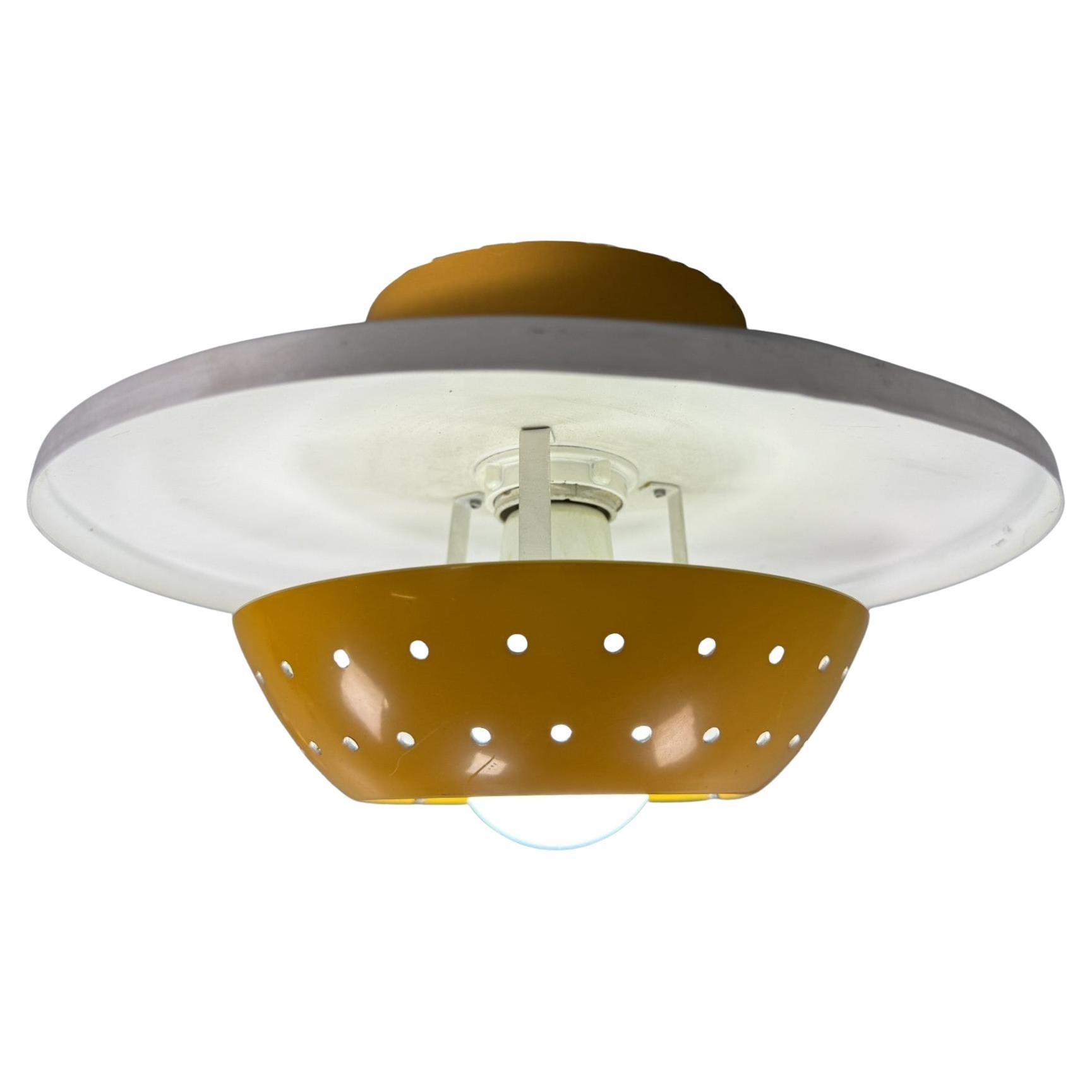 Vintage Philips Netherlands Perforated Yellow Ceiling or wall Lamp 1970s For Sale