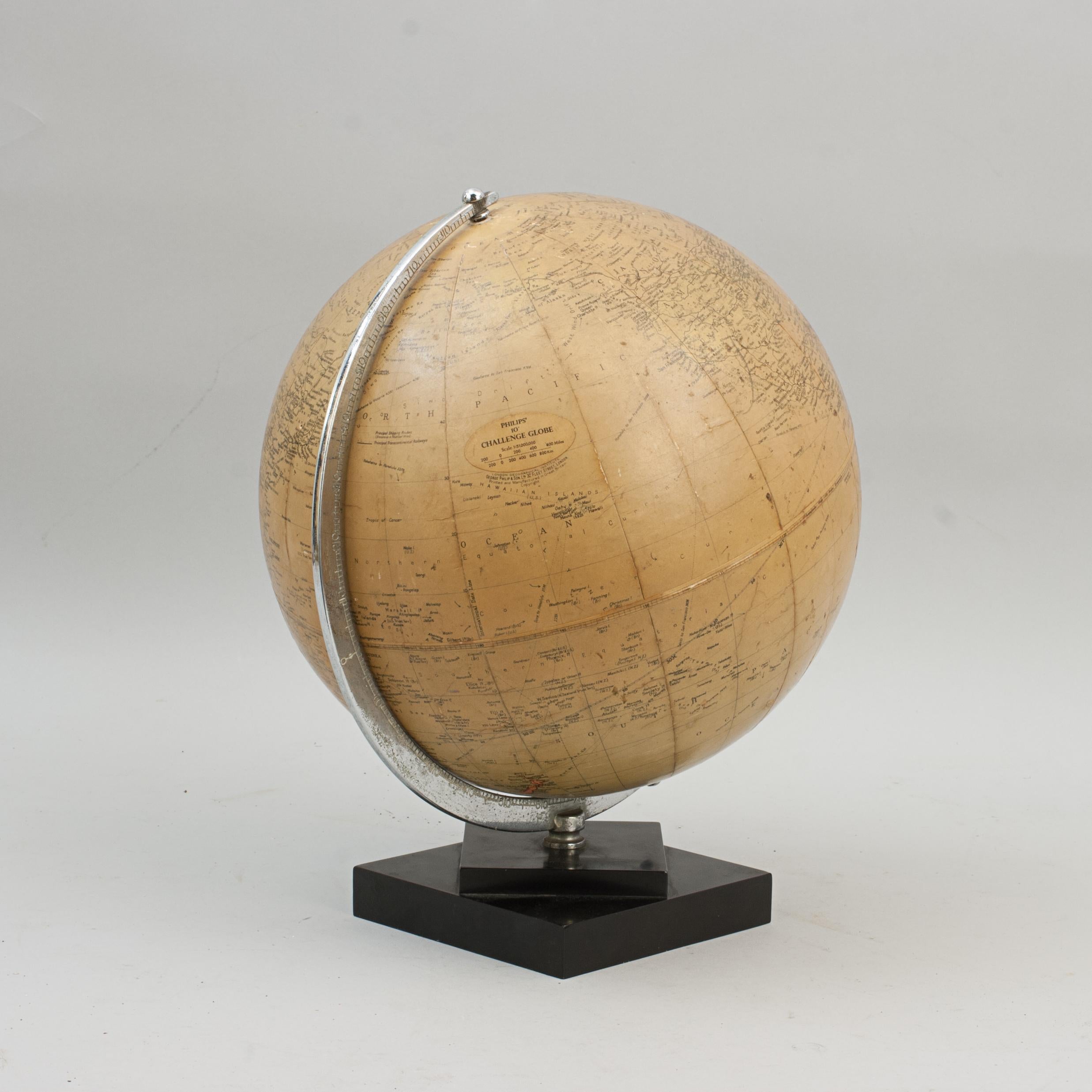 Decorative table top globe.
A miniature model of the earth, scale 1:51,000,000, made by George Philip & Son Ltd. The Philips' 10