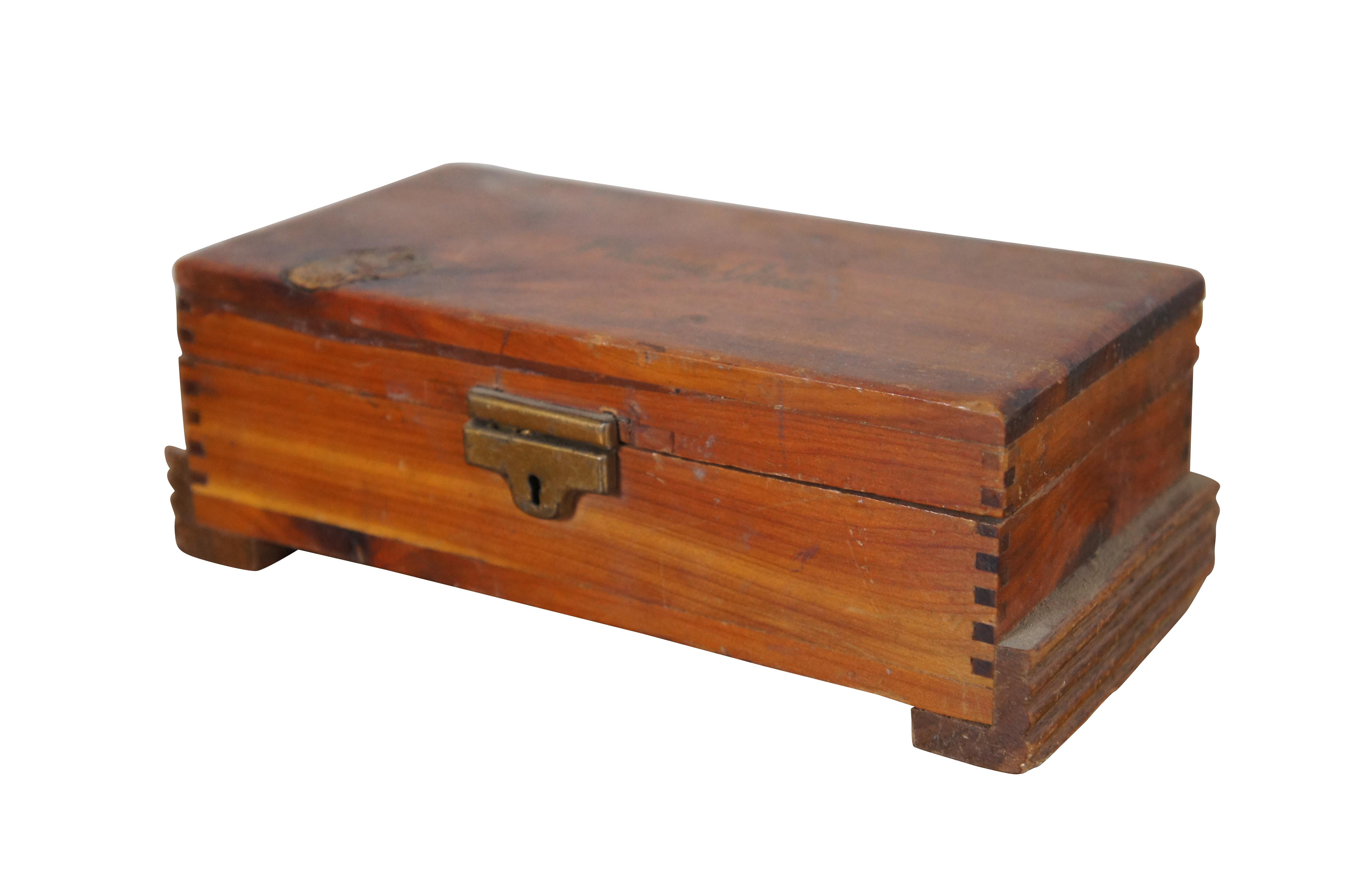 Vintage pine souvenir keepsake box featuring dovetailed joinery, footed base and brass hardware.  Phoenix, Arizona.

Dimensions:
7