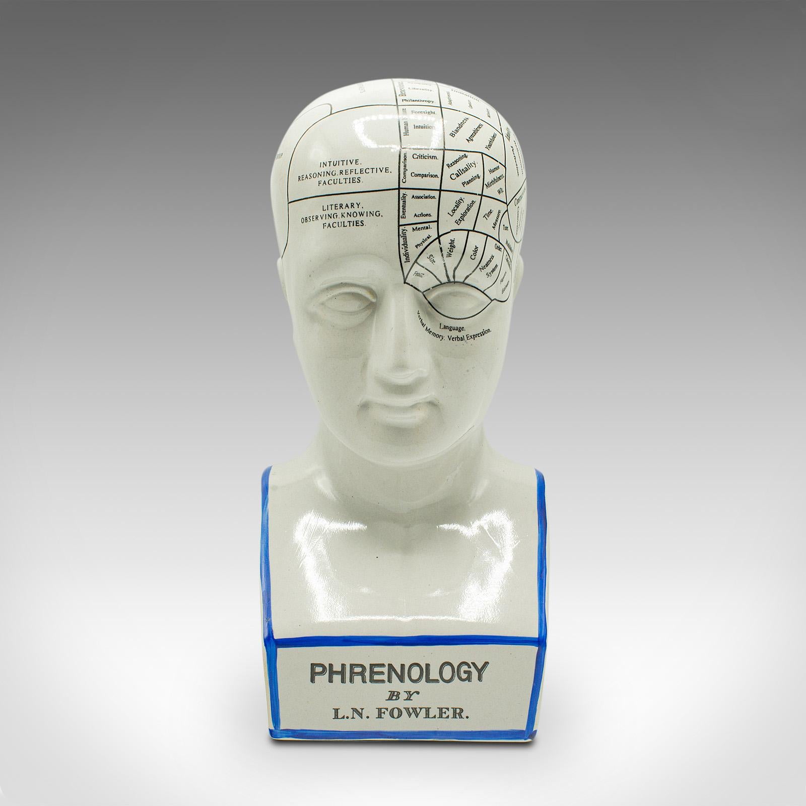 This is a vintage Phrenology head. An English, ceramic decorative bust, dating to the late 20th century.

Charming display of the 18th century science of Phrenology
Displays a desirable aged patina and in good order
Ceramic presents crisp white