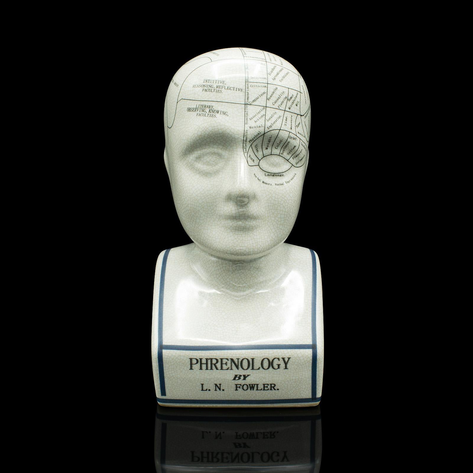 This is a vintage Phrenology head ornament. An English, ceramic decorative bust, dating to the late 20th century, circa 1970.

Appealing decorative example of the 18th century science of Phrenology
Displays a desirable aged patina and in good order
