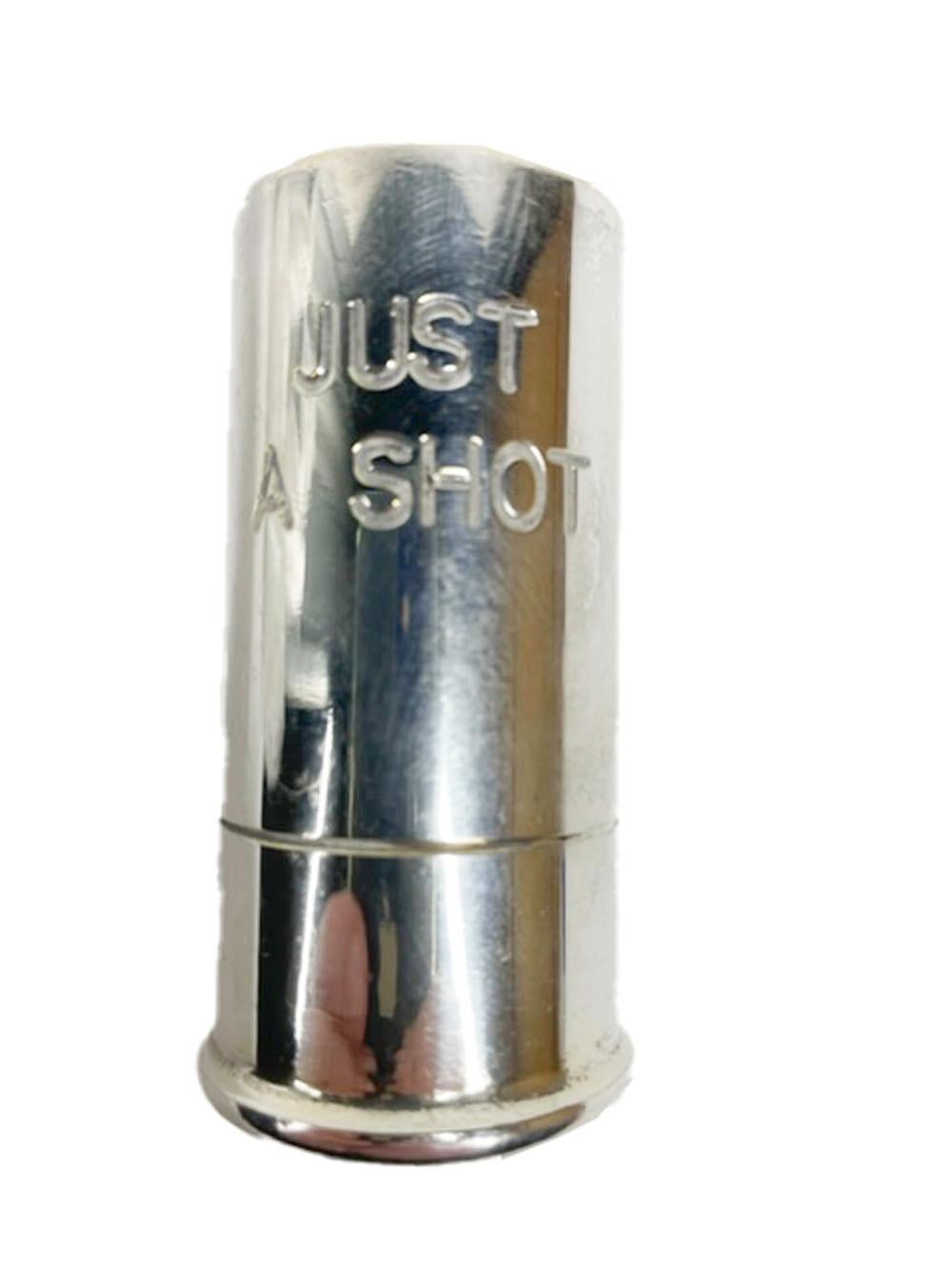 Vintage 1.5 once silver plate jigger in the form of a shotgun shell inscribed 