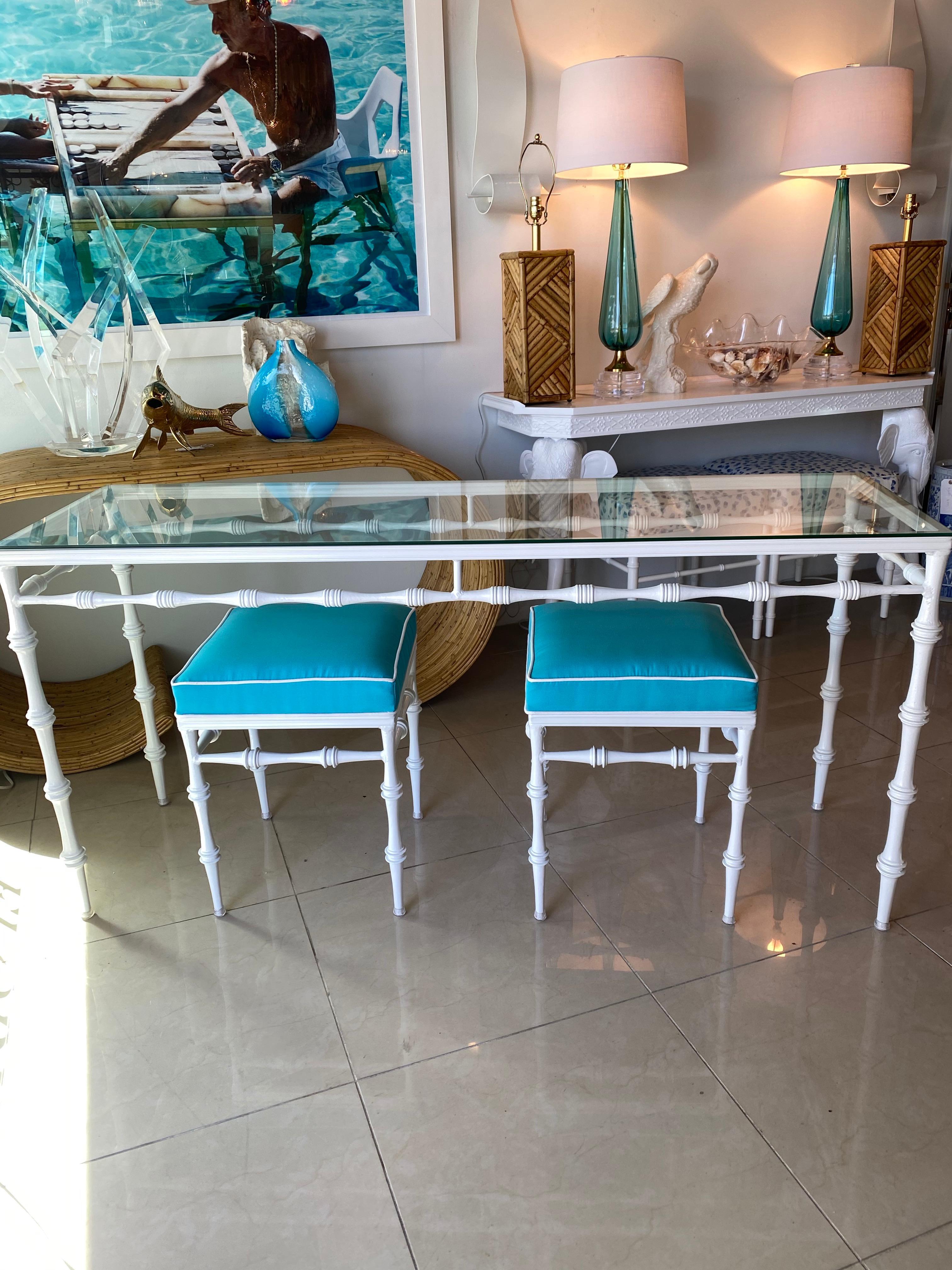 Beautiful vintage patio set by Phyllis Morris. This has been completely, professionally restored to perfection! Console table with pair of benches, ottomans. Console and benches have been professionally powder-coated in a gloss white, new glass top